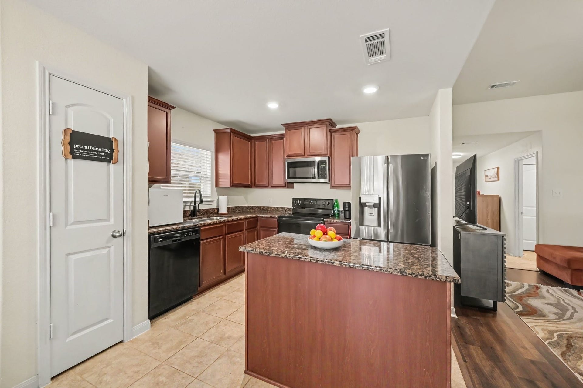 949 Texas Timbers Drive, Katy, TX 77493 Open-concept kitchen flows seamlessly into the family room