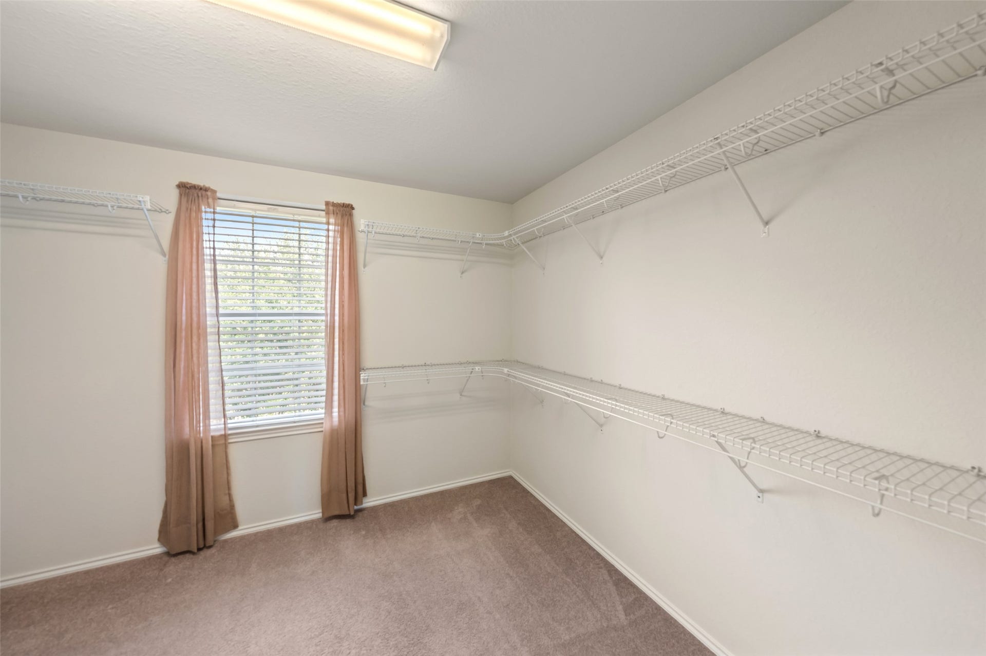 10014 Forrester Trail, Katy, TX 77494 The walk in closet has all your storage needs covered.
