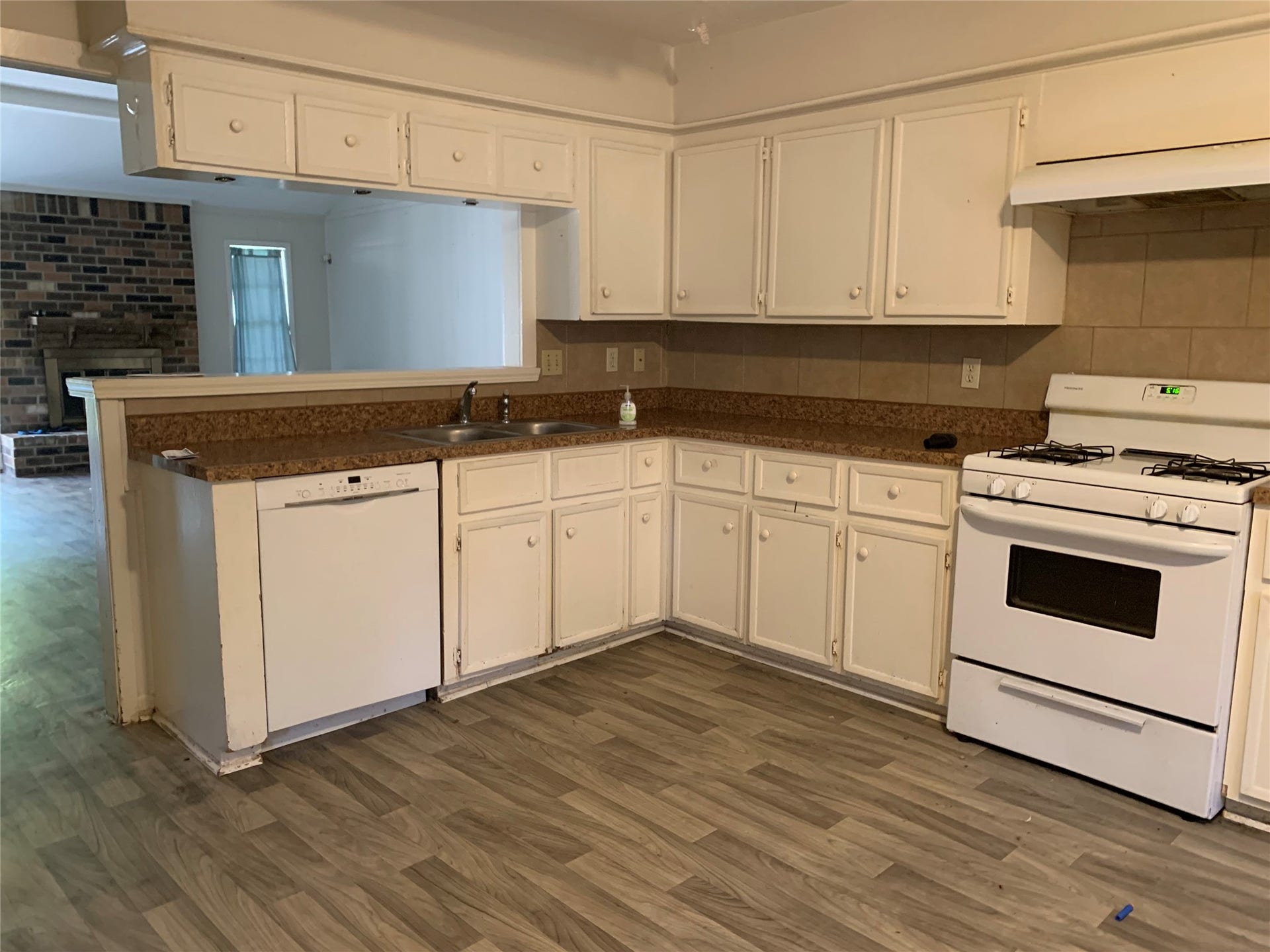 23830 English Oak Drive, Spring, TX 77373 Kitchen, refrigerator nook on the right, looking from Utility entry.