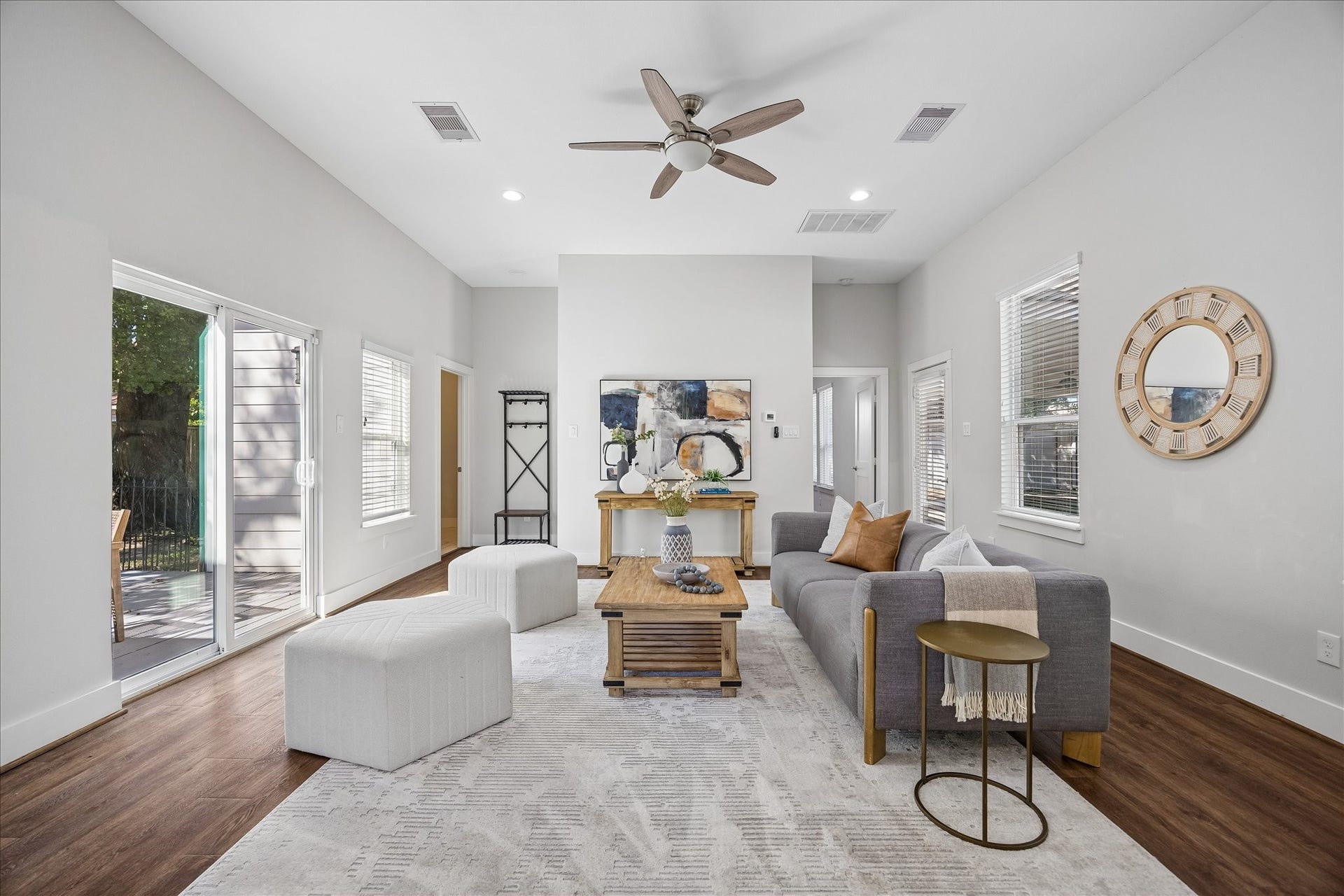 702 W 41st Street, Houston, TX 77018 There's room for everyone to find their favorite spot. This comfortable living area offers plenty of space for family movie nights, weekend football or a quiet afternoon with a good book. Easy access to the patio lets you take the fun outdoors whenever the mood strikes.