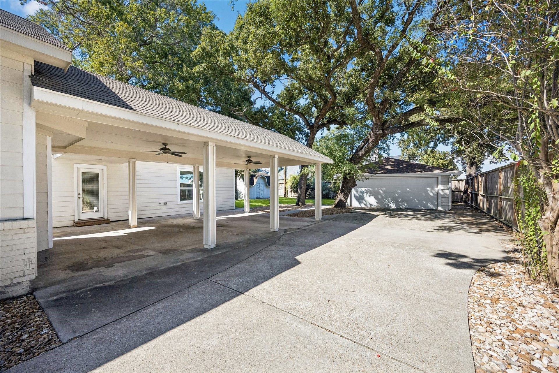 702 W 41st Street, Houston, TX 77018 There's room for everyone to come and go with ease. The expansive gated driveway offers plenty of parking, with a covered area and detached garage for added convenience. Recent upgrades include fiber internet to the garage, a 240V electrical subpanel and an upgraded driveway gate opener with oversized arm and commercial grade magnetic lock.
