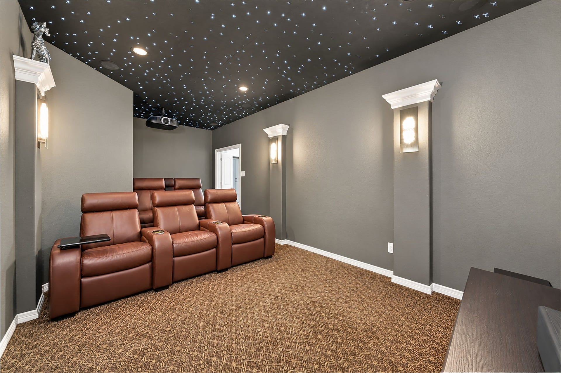 5411 Oban Terrace Lane, Sugar Land, TX 77479 From weekend movie marathons to watching the big game, this dedicated media room offers the ideal place to enjoy entertainment with family and friends.