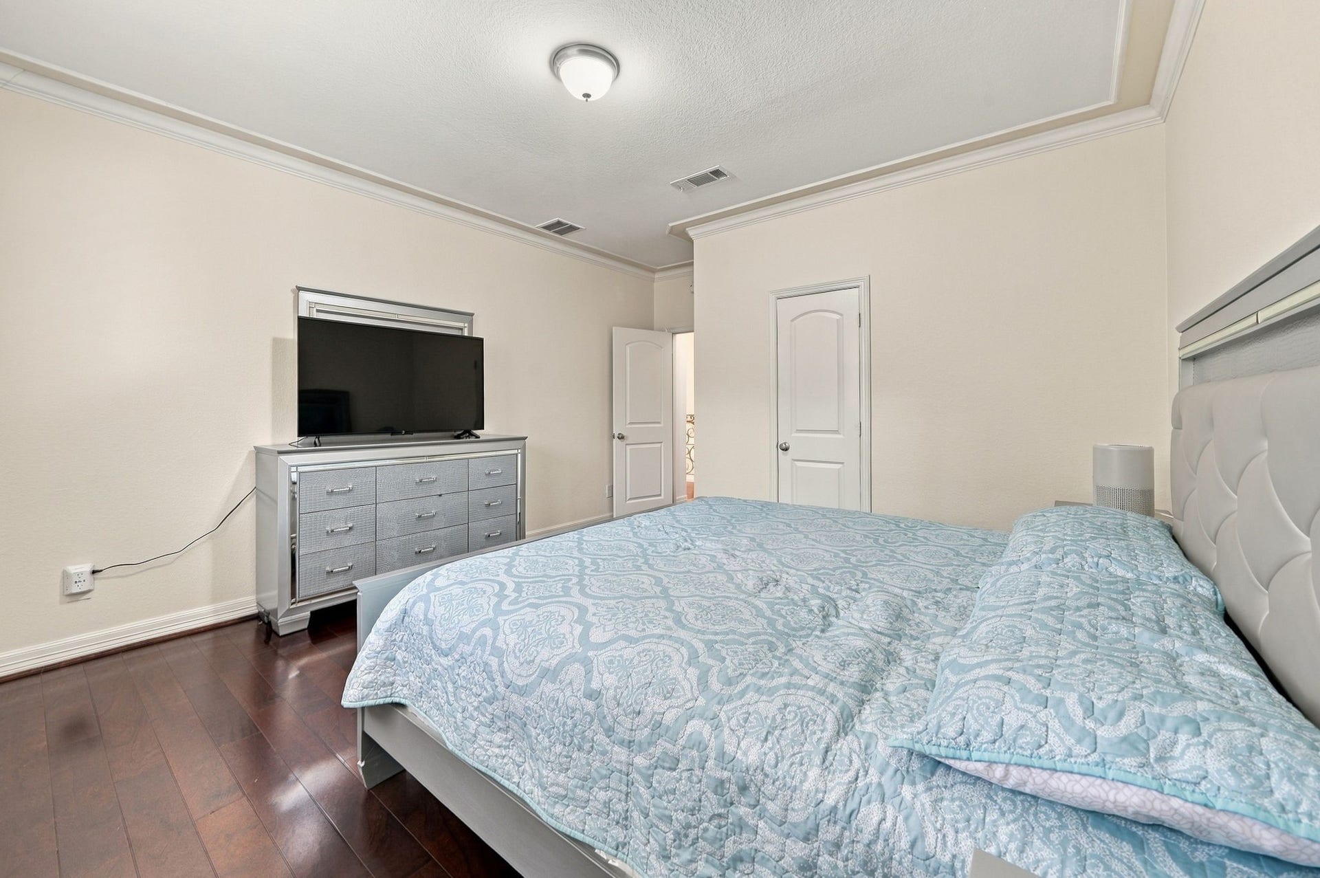 5411 Oban Terrace Lane, Sugar Land, TX 77479 Another view of the bedroom highlights its practical layout, offering a comfortable place to relax with room for your favorite furnishings.