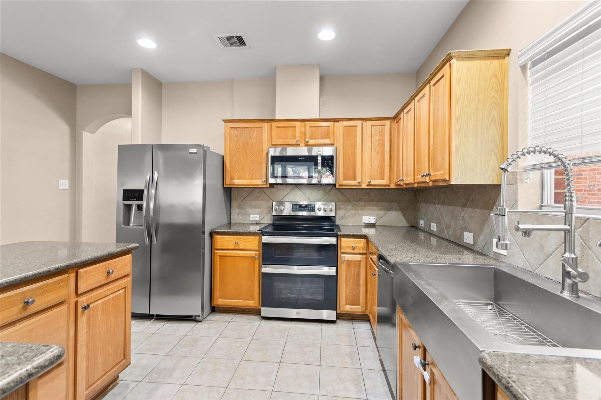 20514 Rustic Rail Court, Cypress, TX 77433 Updated SS appliances plus huge SS farmhouse sink