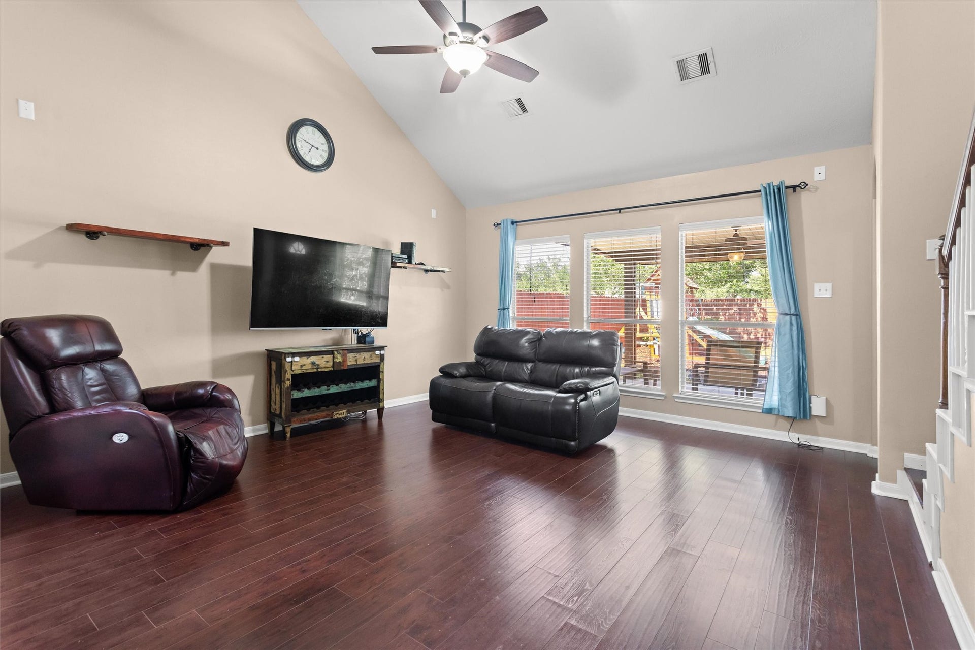 20514 Rustic Rail Court, Cypress, TX 77433 Living room with soaring 2 story ceiling and wall of windows for plenty of natural light