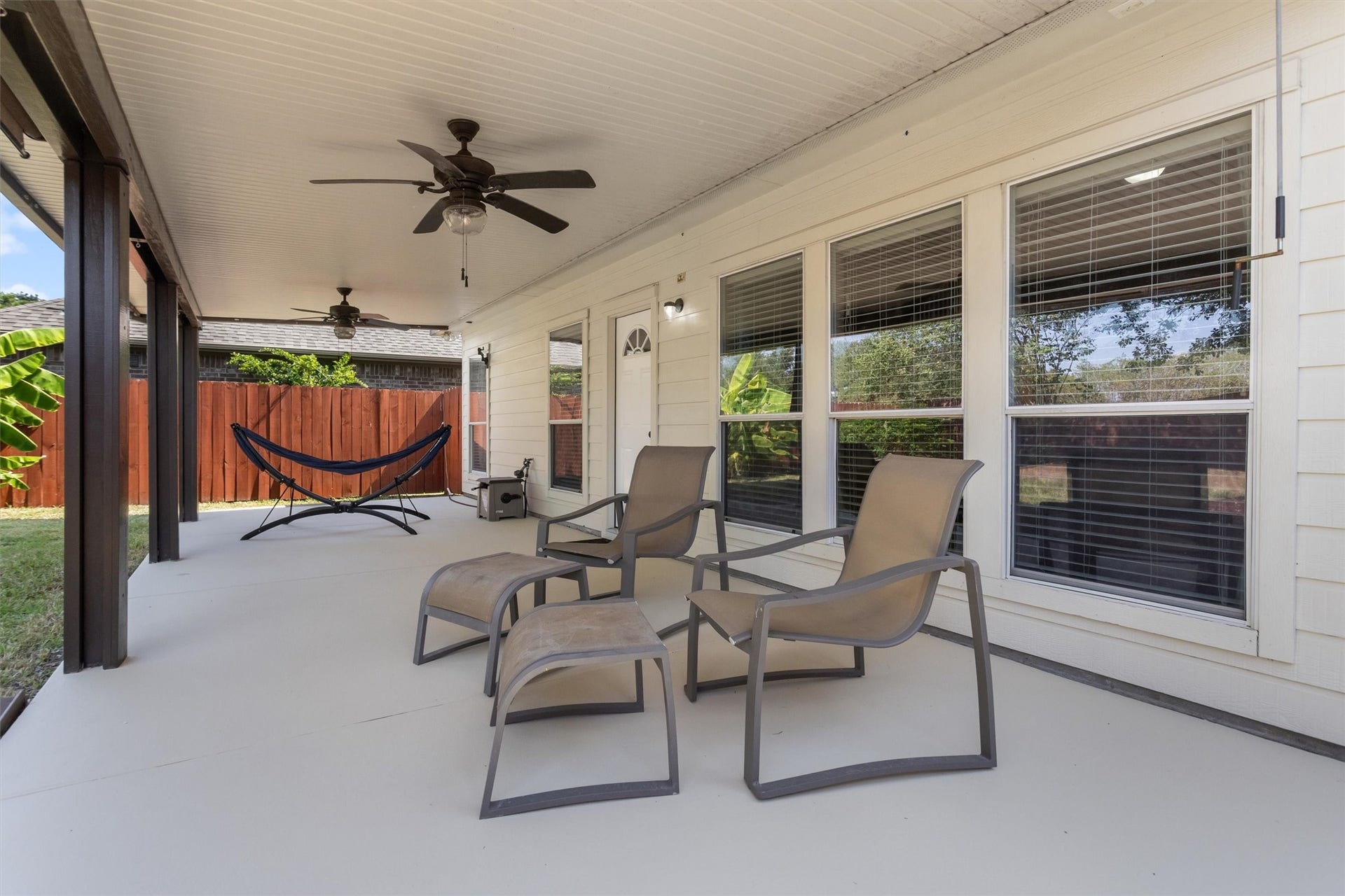 20514 Rustic Rail Court, Cypress, TX 77433 35x12 covered back patio extends the length of the house