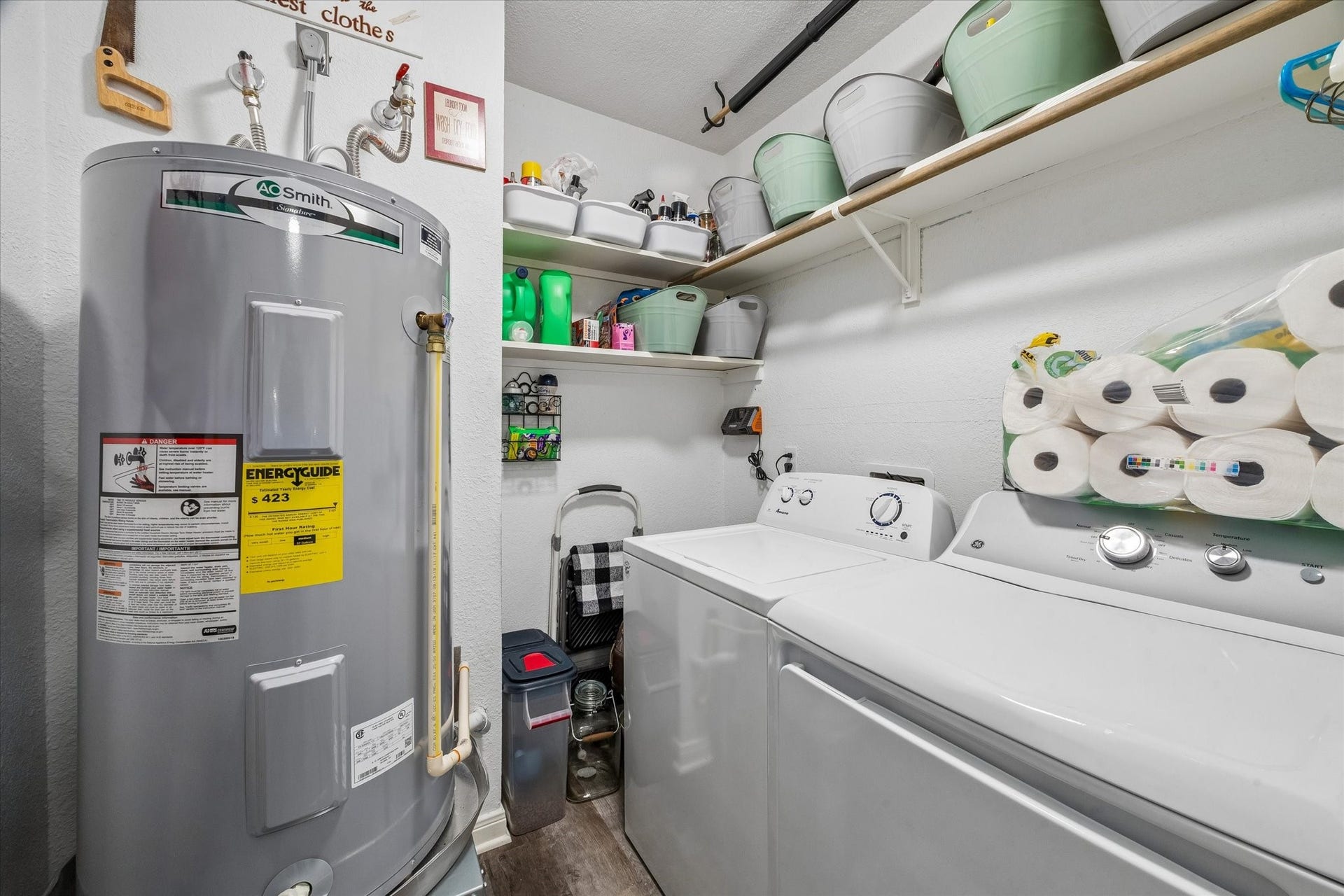 1426 15th Avenue N, Texas City, TX 77590 Utility room. The washer and dryer stay.