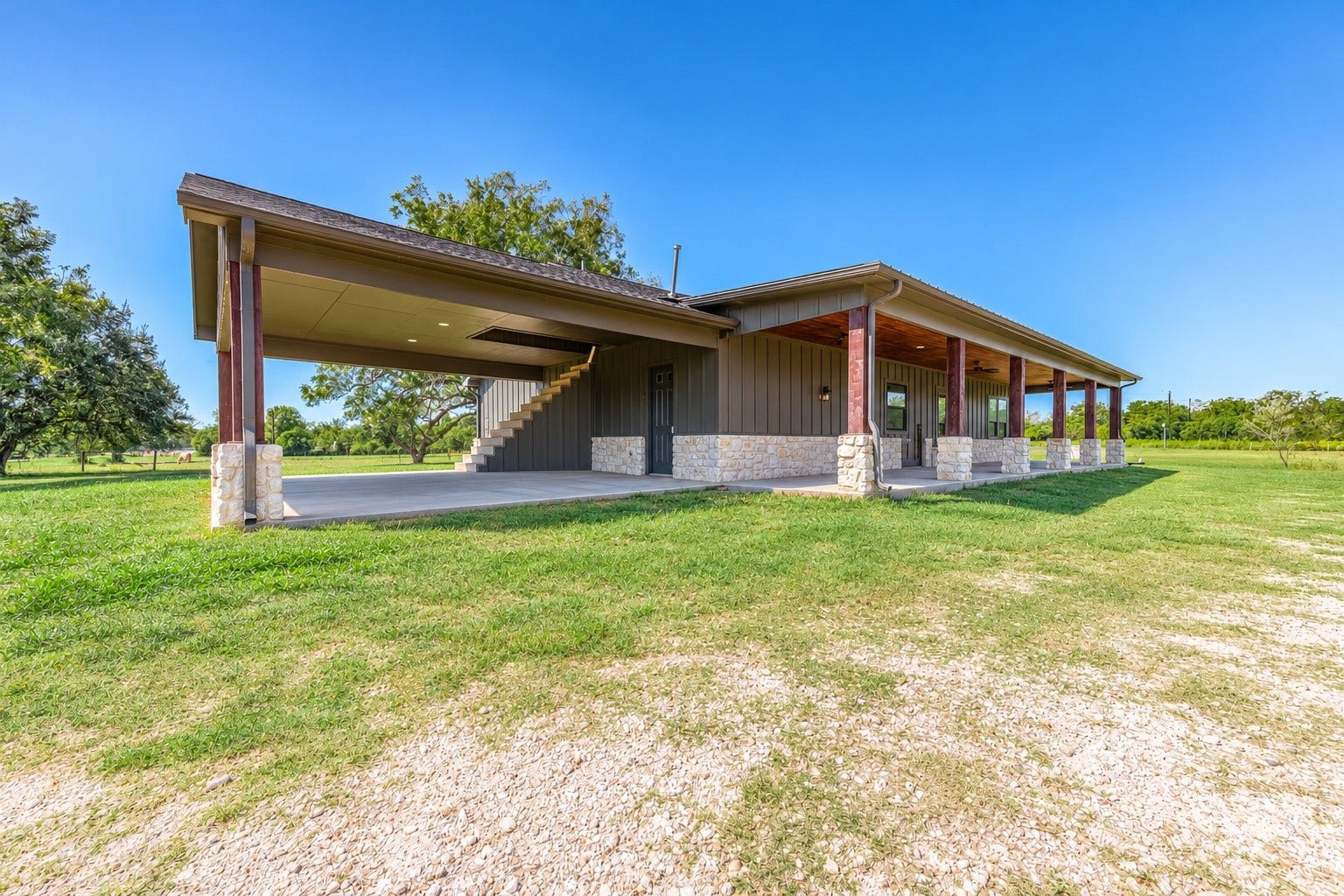 3295 Fm 524 Road, Sweeny, TX 77480 Large covered outdoor area and carport for shaded parking, equipment or entertaining. This photo may be edited using AI tools.