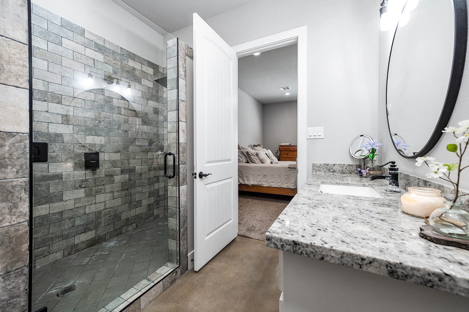 3295 Fm 524 Road, Sweeny, TX 77480 Primary bathroom walk-in shower with tile surround and frameless glass door. This photo may be edited using AI tools.