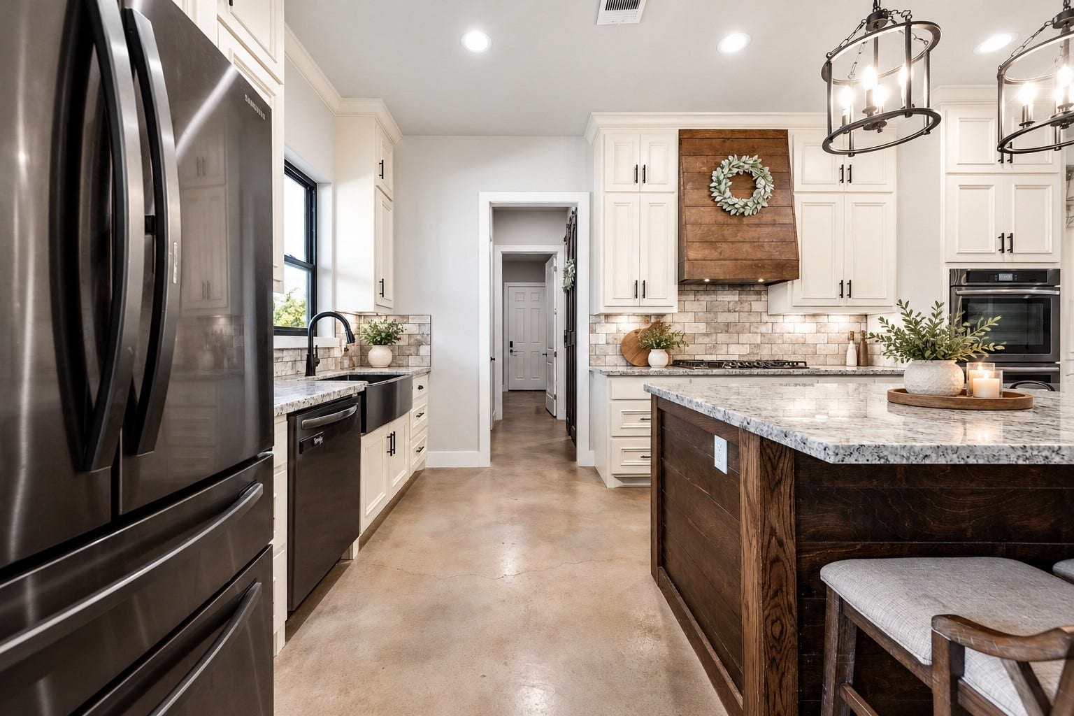 3295 Fm 524 Road, Sweeny, TX 77480 Kitchen with stainless refrigerator, dishwasher, granite counters and a walk-in pantry nearby. This photo may be edited using AI tools.