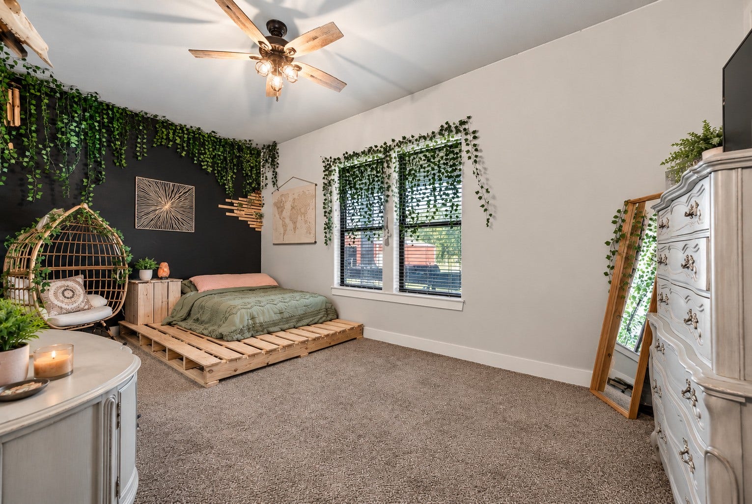 3295 Fm 524 Road, Sweeny, TX 77480 Secondary bedroom with carpet, ceiling fan and natural light; flexible space for guests, an office or hobbies. This photo may be edited using AI tools.