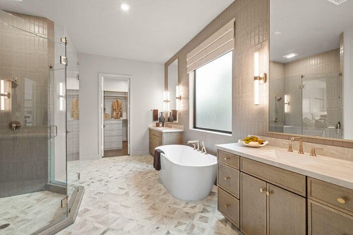 7114 Quaker Meadows Drive, Katy, TX 77493 The masterful main bathroom includes an oversized shower. Representative image.