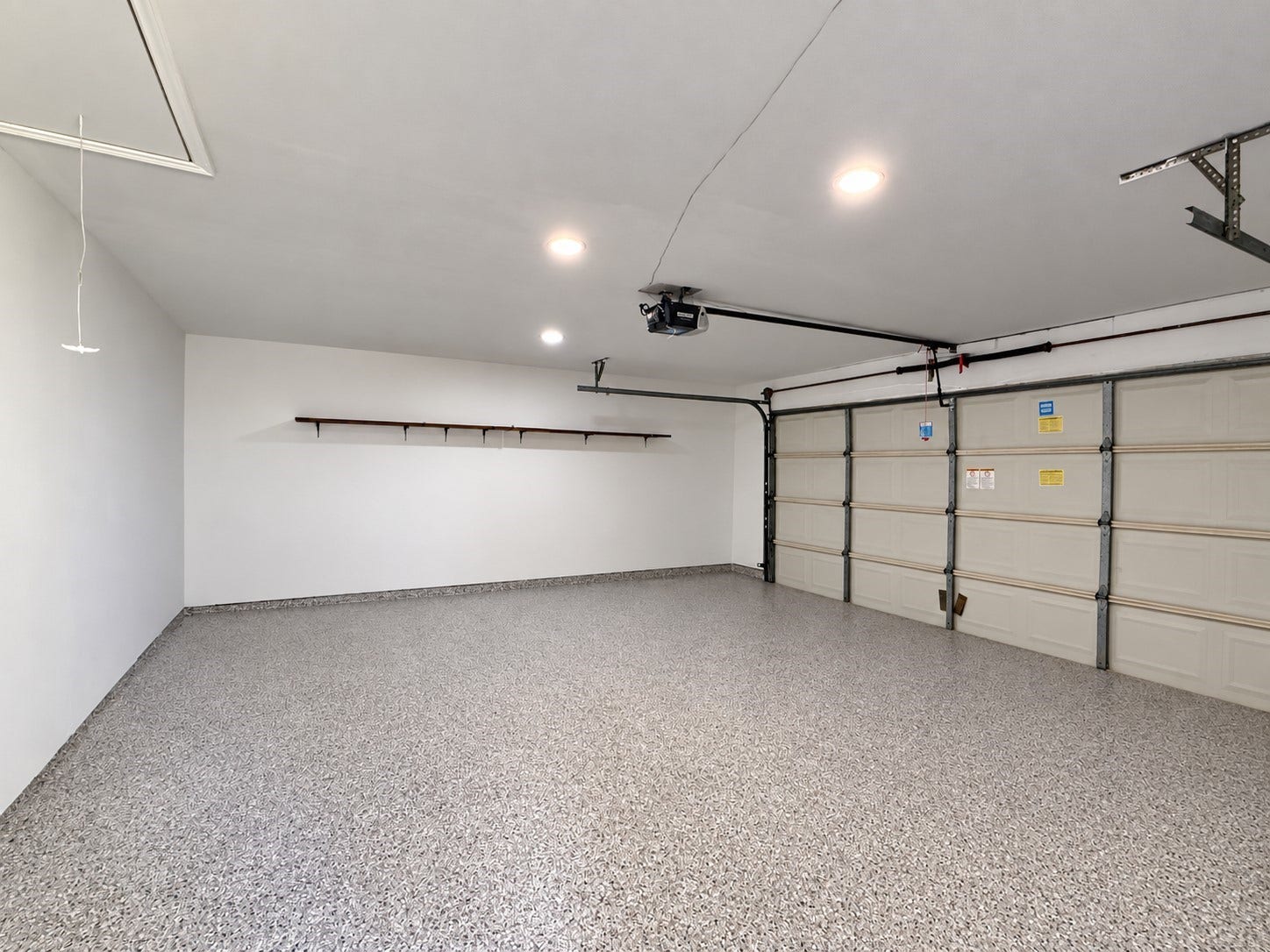 7526 Goldfinch Drive, Humble, TX 77396 2 car garage with epoxy flooring