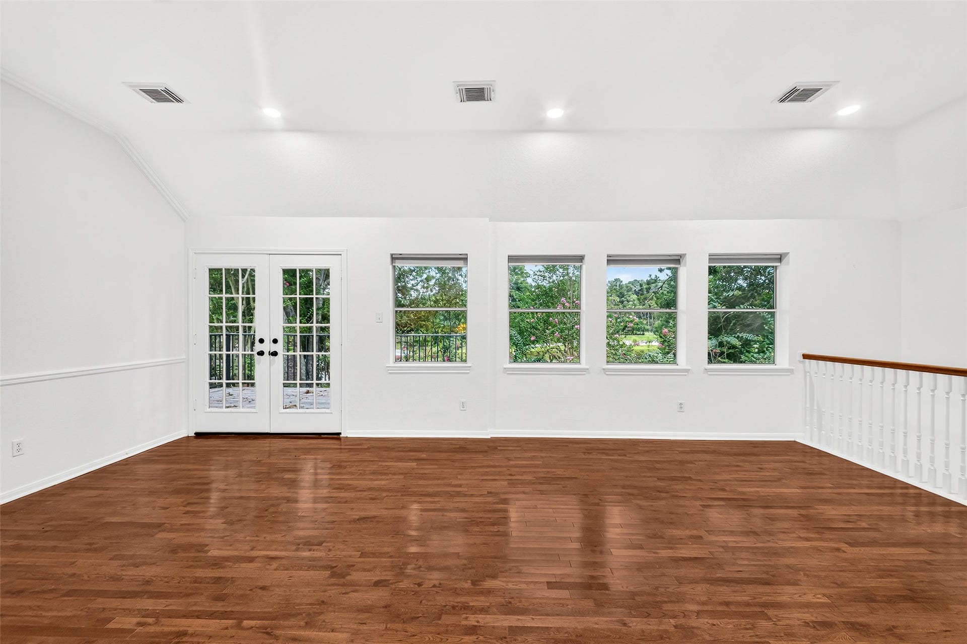 9515 Sotherloch Lake Drive, Spring, TX 77379 2nd floor game room with double French doors leading to the balcony, providing the grand view of the lake.