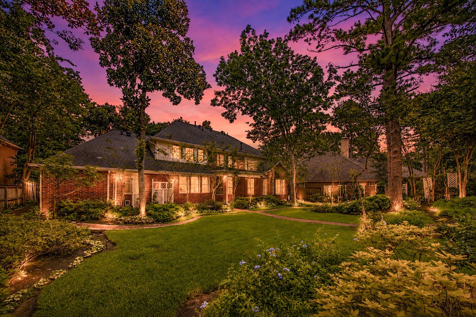 9515 Sotherloch Lake Drive, Spring, TX 77379 This backyard is a stunning oasis, no matter which angle you are viewing from! Lush landscaping an beautiful border walk-ways.