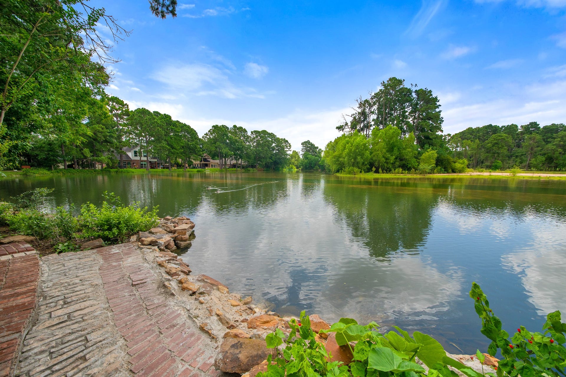9515 Sotherloch Lake Drive, Spring, TX 77379 Some homes check the boxes. Others make you never want to leave. Especially when this is the view from the privacy of your own backyard.