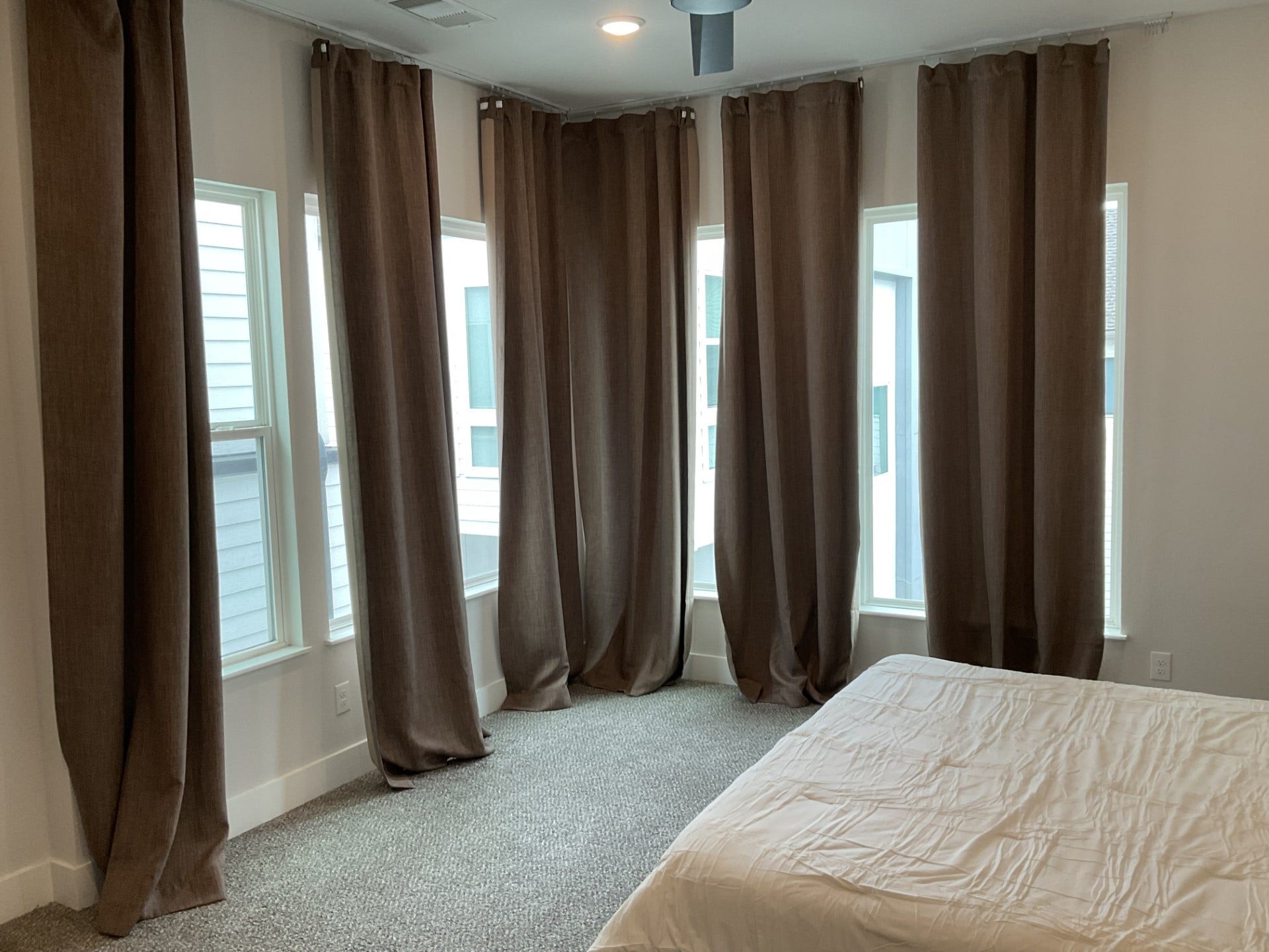 4214 Spencer Street, Houston, TX 77007 Master bedroom with lots of light. Drapes will be removed. Rods will stay.