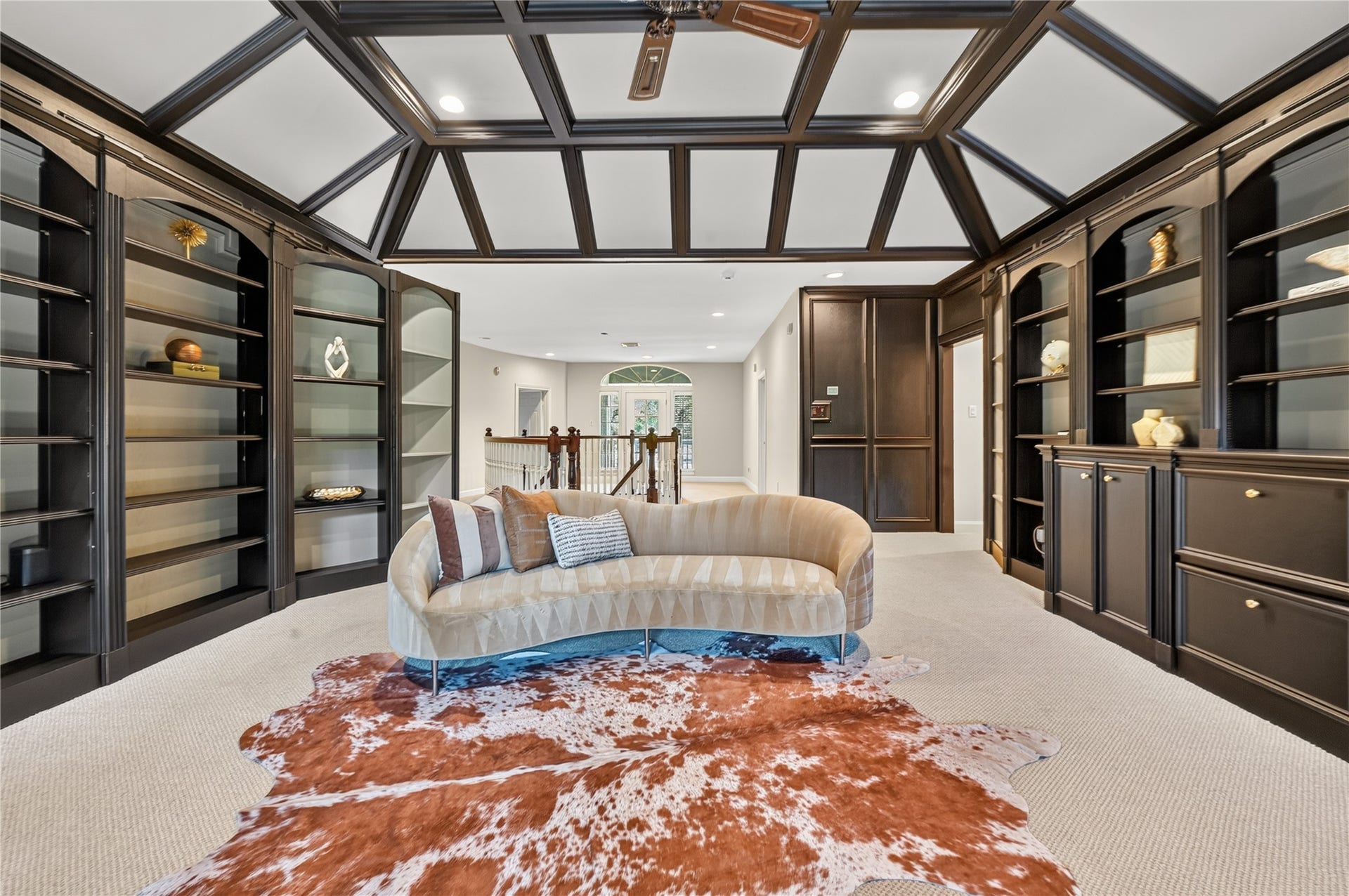 4510 River Forest Drive, Richmond, TX 77406 Media rooms and bedrooms are flanked on both sides of playroom. 2 staircases lead to front and side entry of home.