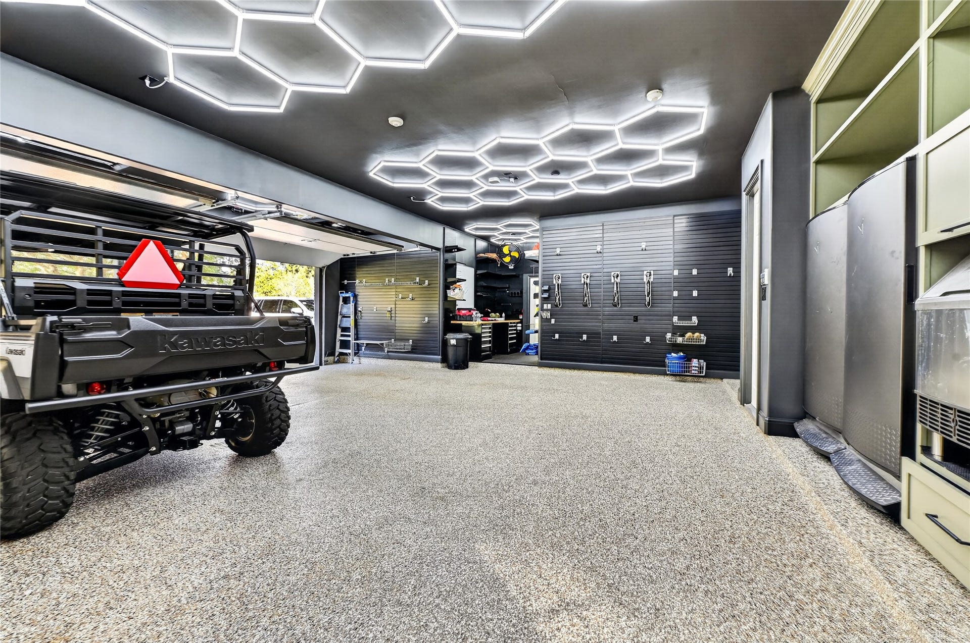 4510 River Forest Drive, Richmond, TX 77406 Garage recently upgraded with extensive organization and lift systems for storage.
