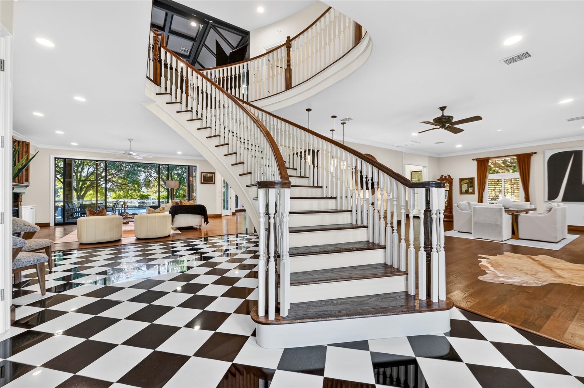 4510 River Forest Drive, Richmond, TX 77406 This grand entry staircase at the front of the home evokes a strong sense of character that carries through every room of this home.