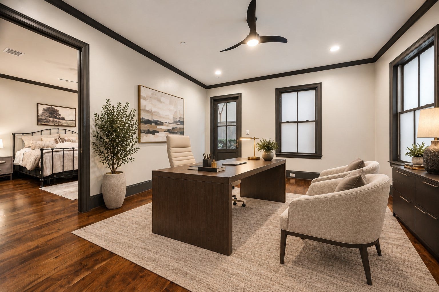 2131 Bancroft Street, Houston, TX 77027 Virtually staged as an elegant home office, this spacious, versatile first-floor room adjoins the guest bedroom and offers direct backyard access, creating an ideal private suite with a dedicated study, lounge, or fitness space.