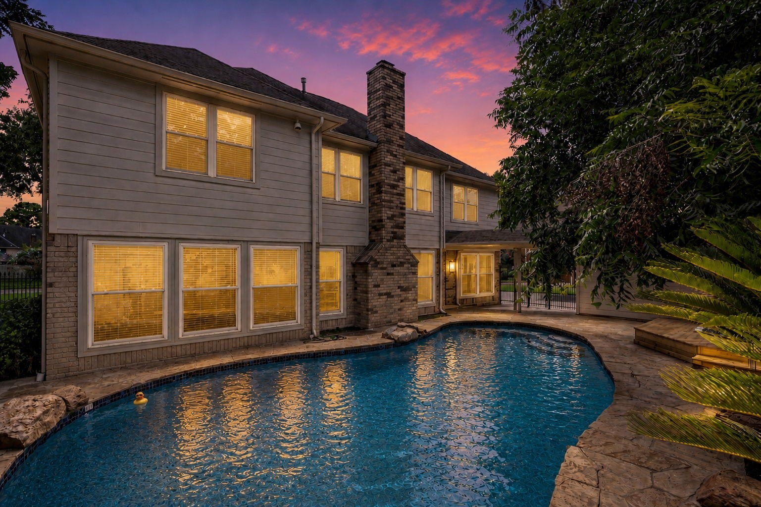 75 Stalybridge Street, Sugar Land, TX 77479 The backyard unfolds into a private outdoor retreat with a sparkling pool, expansive decking & lush mature landscaping. A separate hot tub deck offers another inviting space to unwind while enjoying the peaceful surroundings.