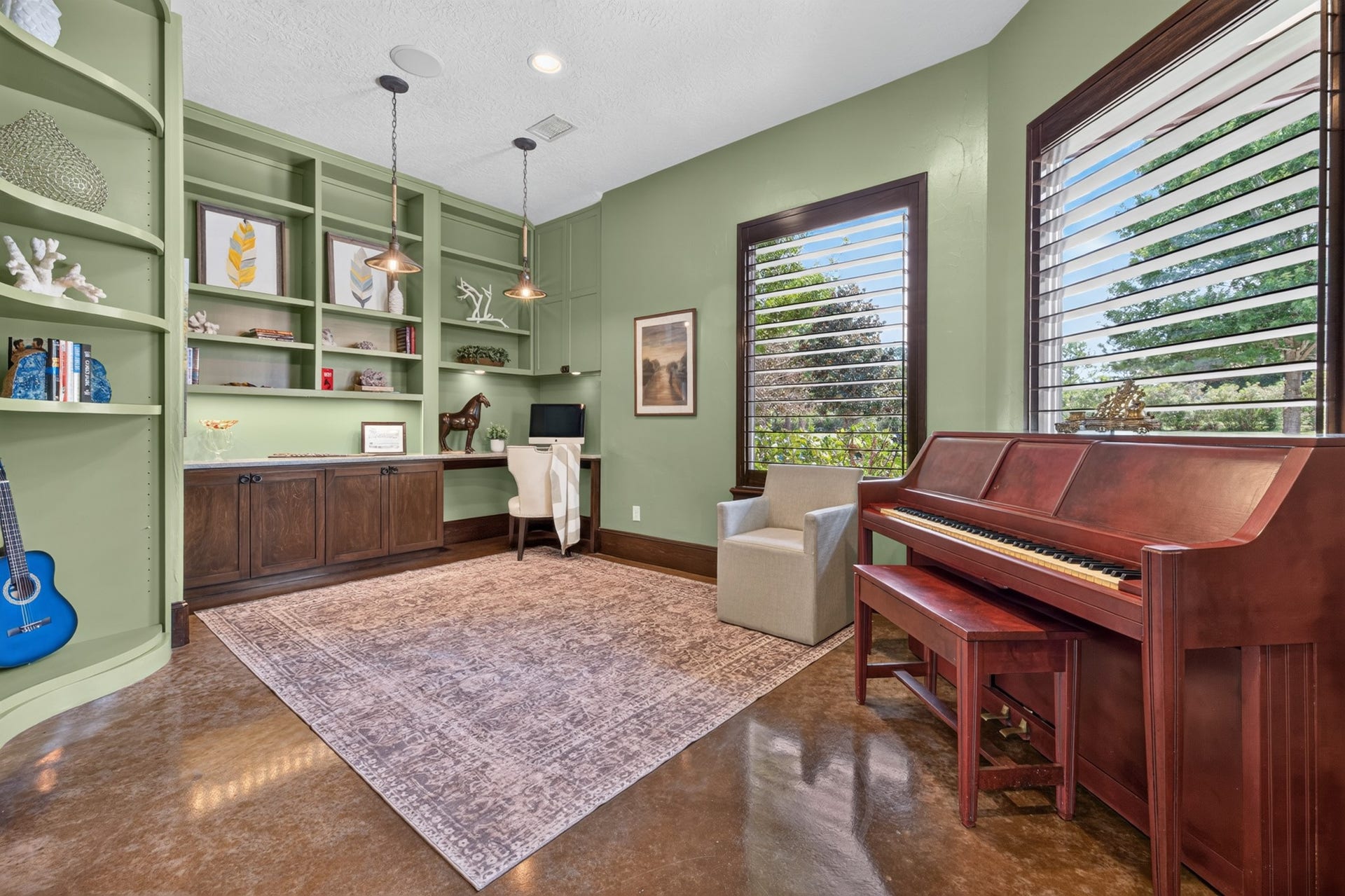 24005 Old Dobbin Plantersville Road, Montgomery, TX 77316 A refined office and music room offers a beautiful setting for work, creativity and reflection.