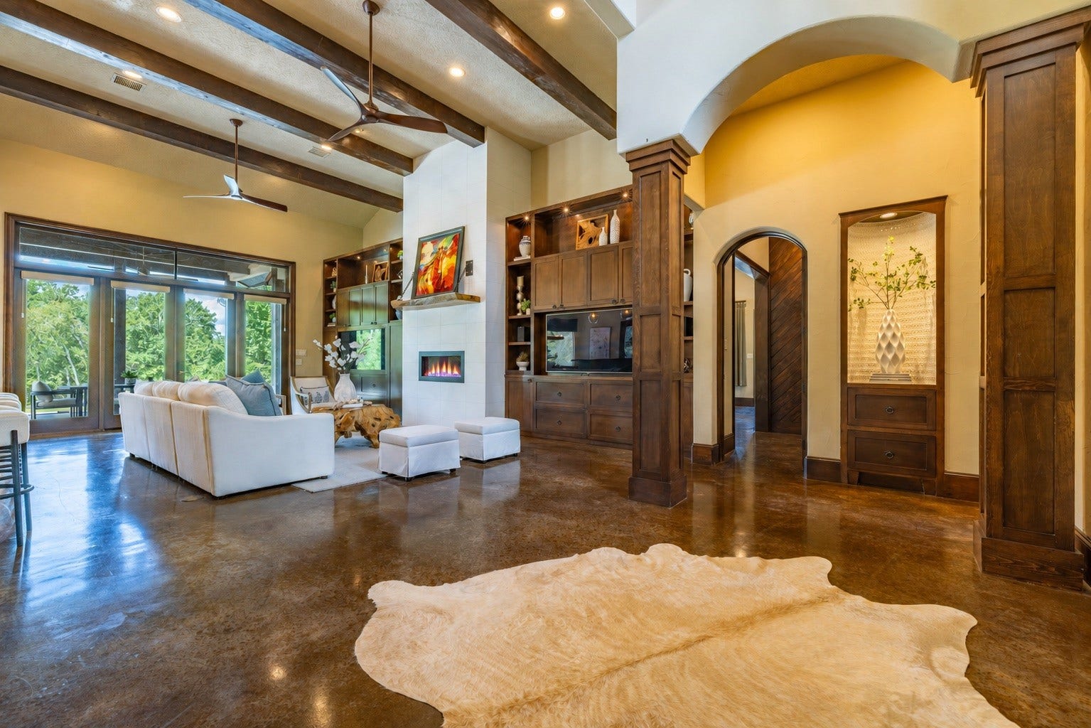 24005 Old Dobbin Plantersville Road, Montgomery, TX 77316 Soaring beams, walls of light and pool views make this the heart of family life.