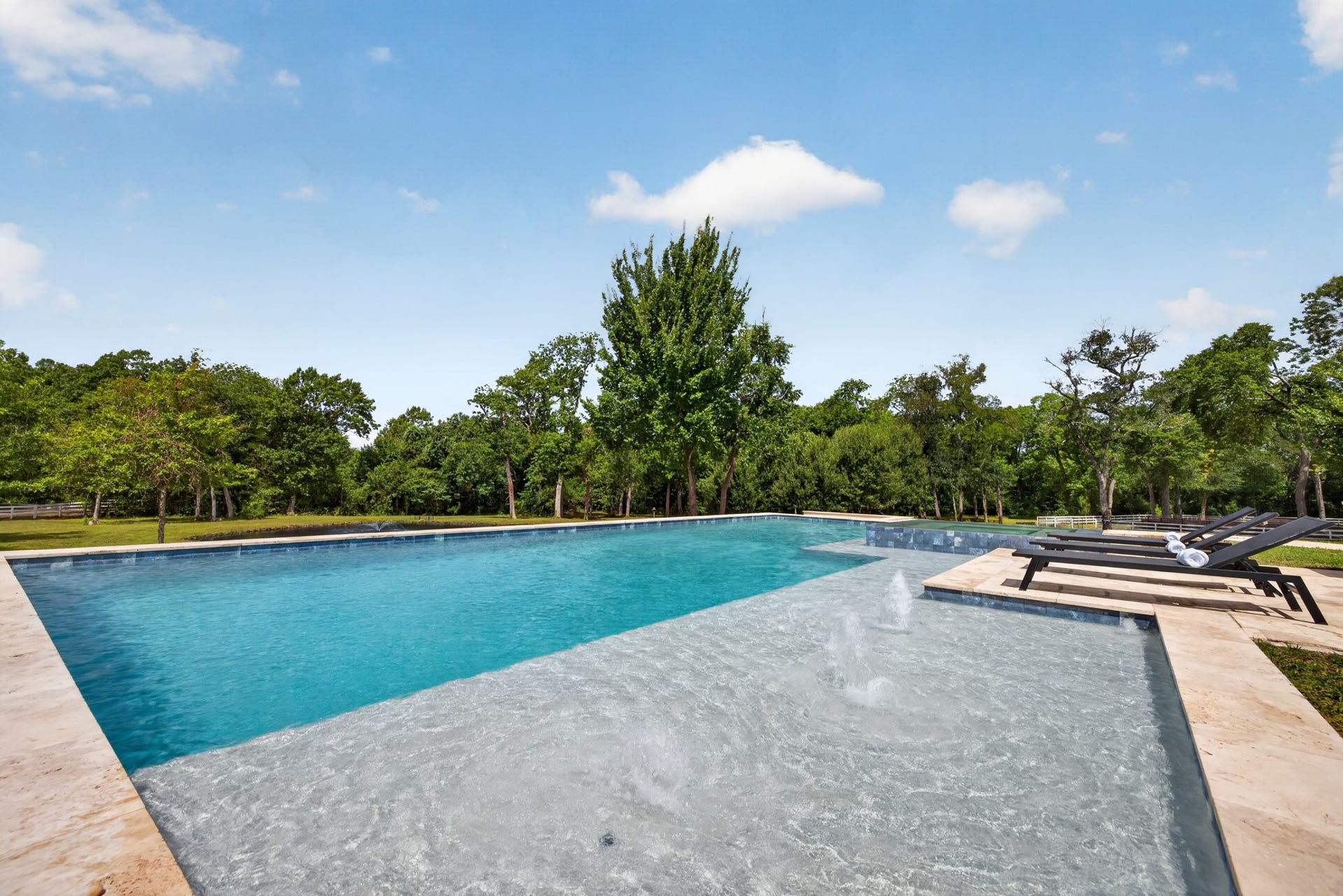 24005 Old Dobbin Plantersville Road, Montgomery, TX 77316 The 40-foot lap pool was made for morning swims, family play and sun-filled afternoons.