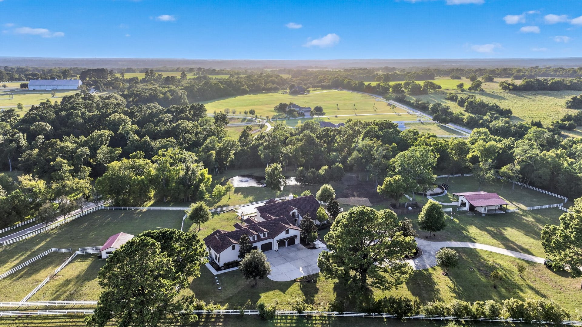 24005 Old Dobbin Plantersville Road, Montgomery, TX 77316 More than eight private acres unfold with a pool, pond, pasture and your own private resort.