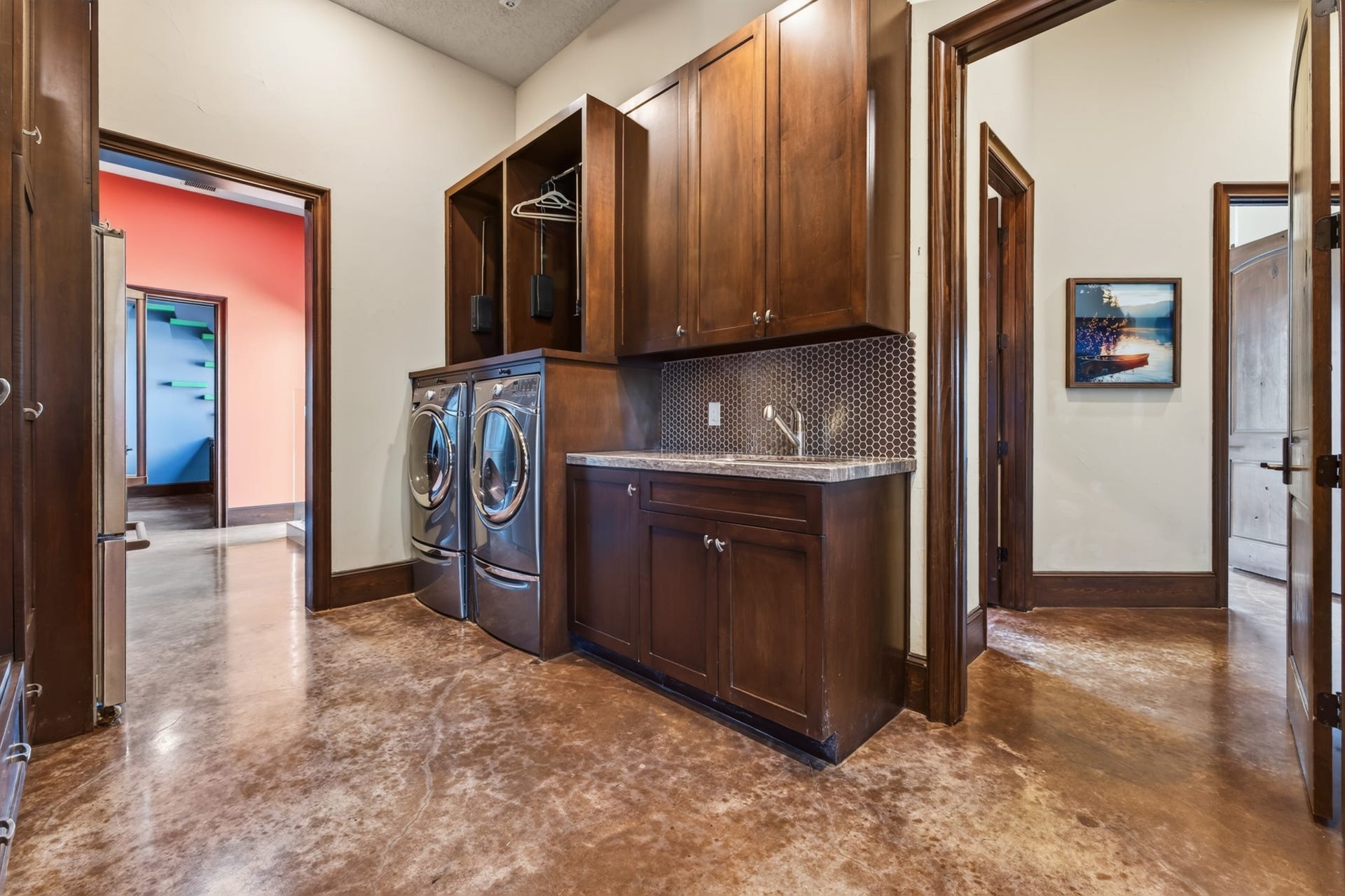 24005 Old Dobbin Plantersville Road, Montgomery, TX 77316 An unusually spacious laundry room brings exceptional storage and ease to everyday country living.