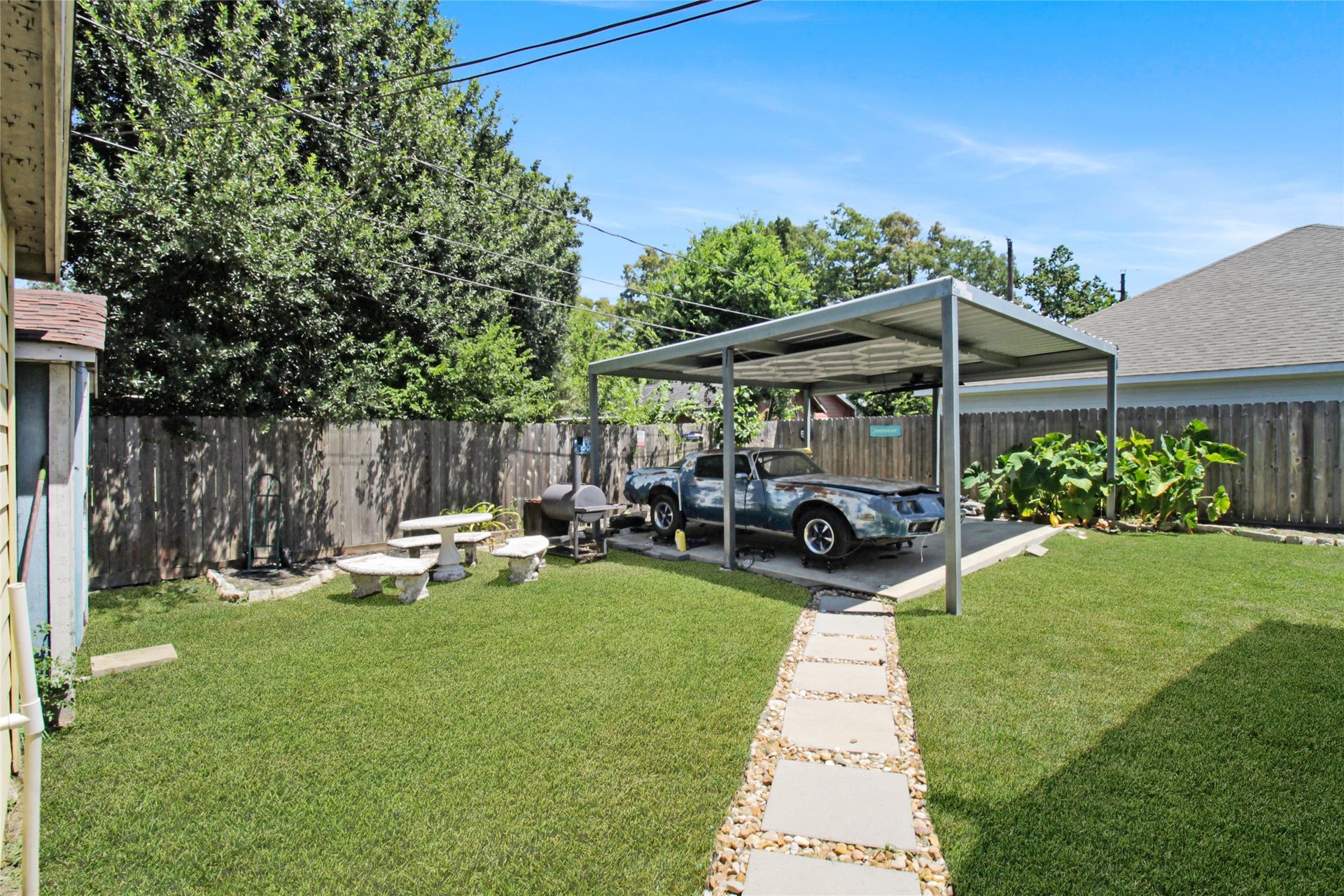 306 W Houston Avenue, Pasadena, TX 77502 Looking at second car port in back yard
