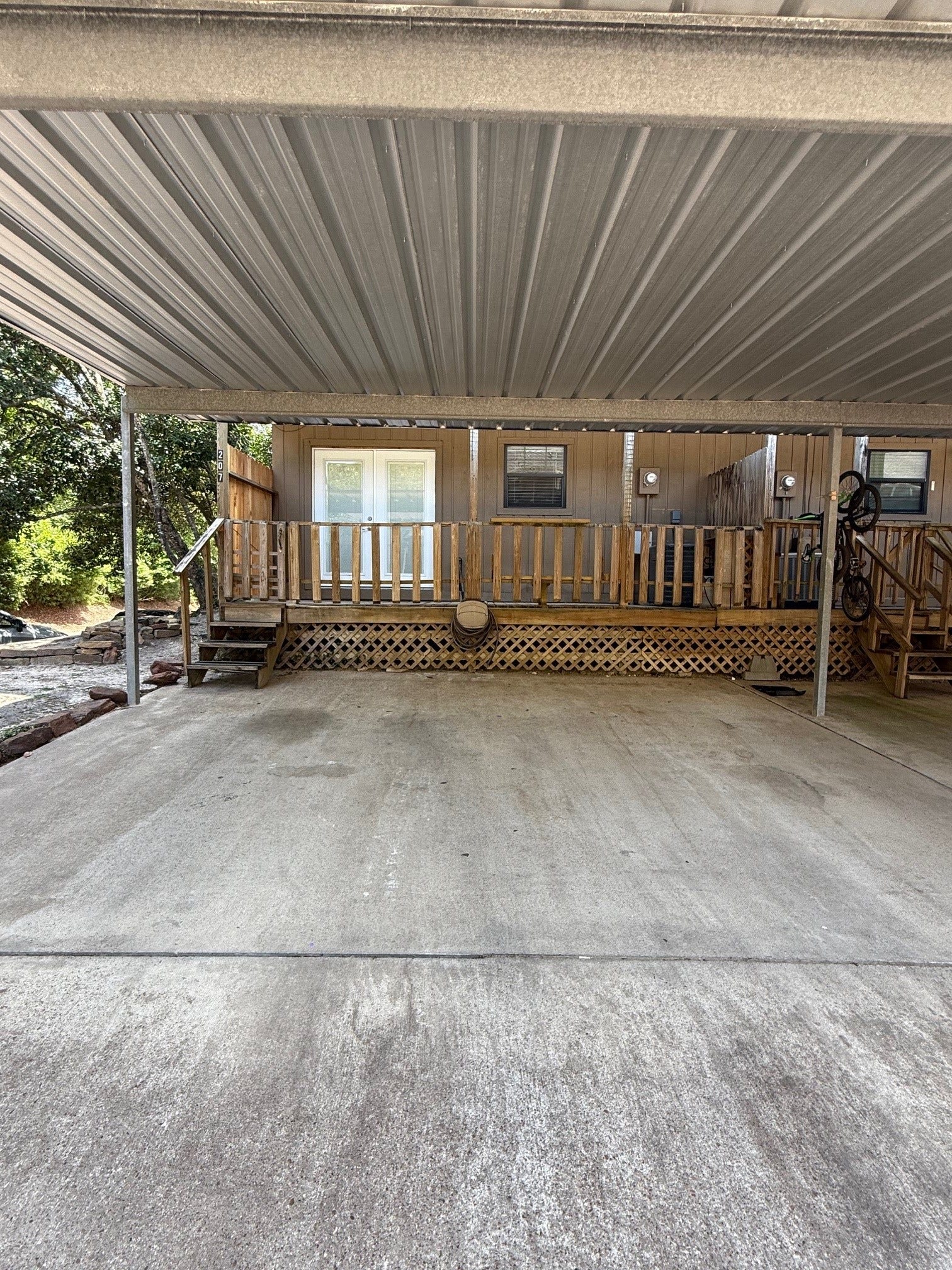 1011 Hamblen Road, #207, Kingwood, TX 77339 Carport