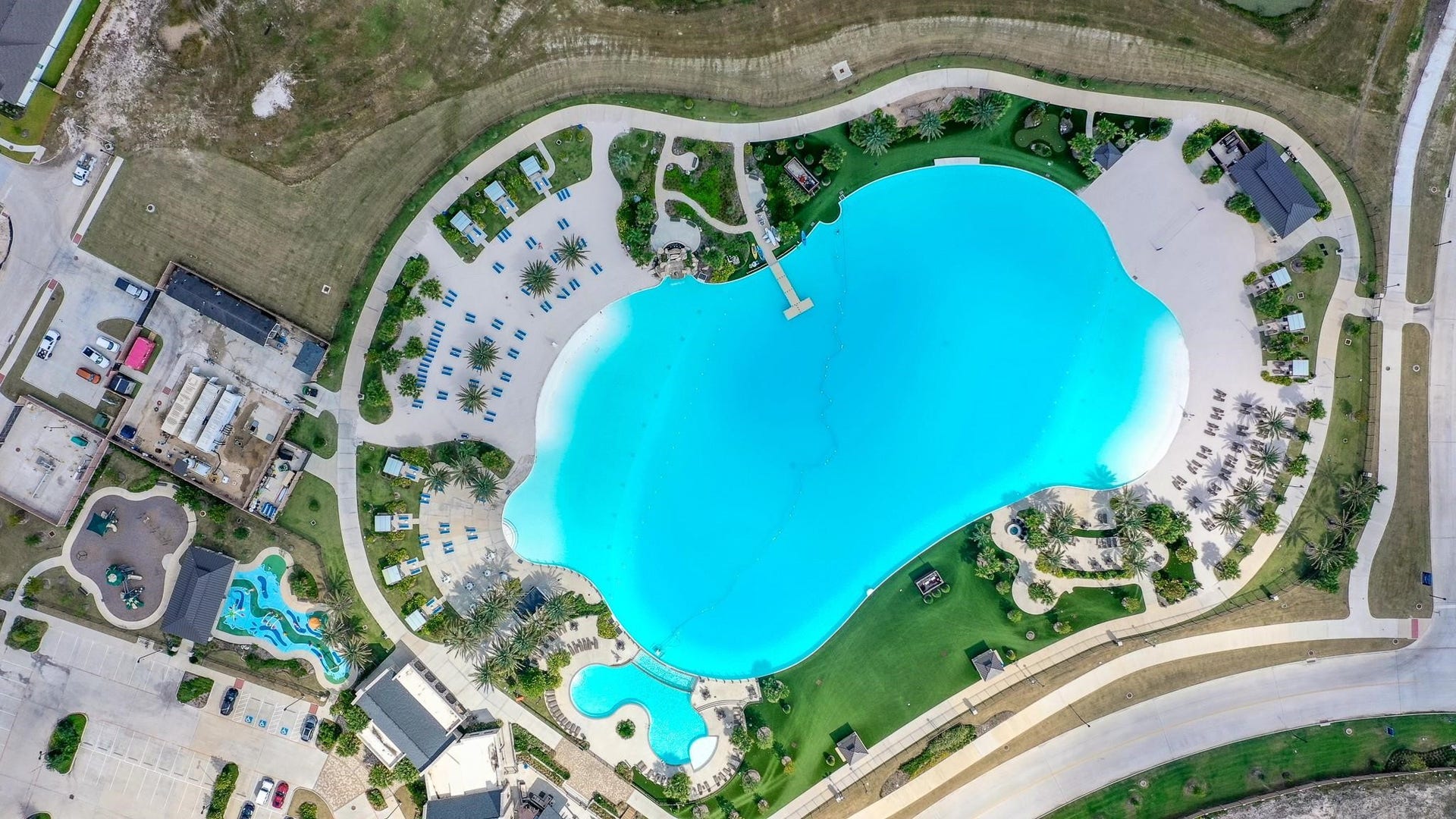 15611 Kirkton Raye Drive, Humble, TX 77346 Experience resort-style living with luxurious amenities centered around the stunning Crystal Clear Lagoon and vibrant Amenity Village.