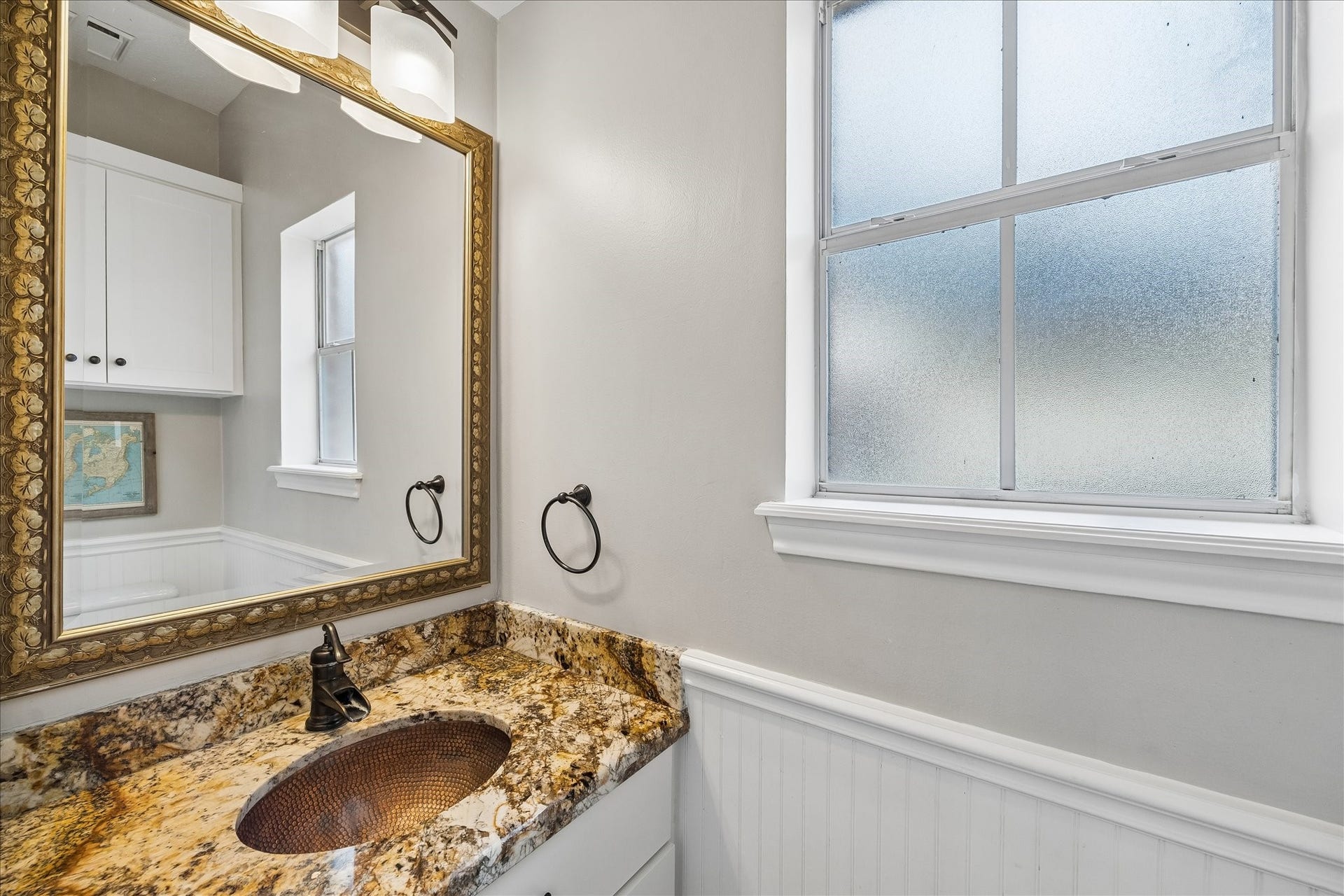 2411 Kings Lodge Drive, Kingwood, TX 77345 Convenient half bath right off of kitchen, and just steps away from the backyard!
