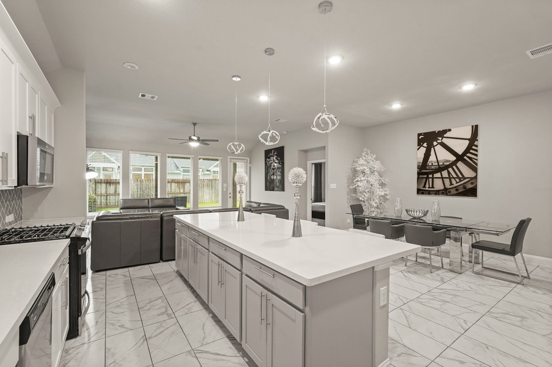 1710 Forest Mist Drive, Missouri City, TX 77459 A fantastic look at the home's main level layout, emphasizing its airy and connected feel.