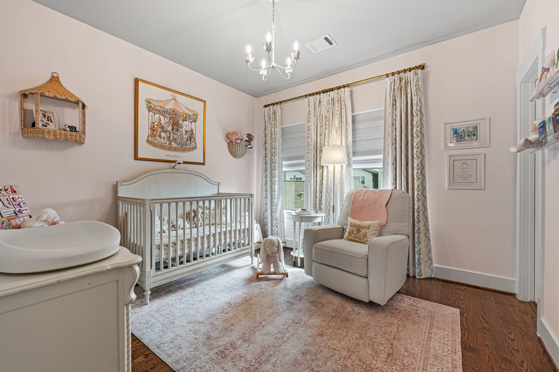 868 Wakefield Drive, #B, Houston, TX 77018 Wood flooring and delicate ceiling trim lend this secondary bedroom a quietly elegant character. Soft natural light keeps the versatile interior bright and restful. Note Visual Comfort chandelier is excluded.