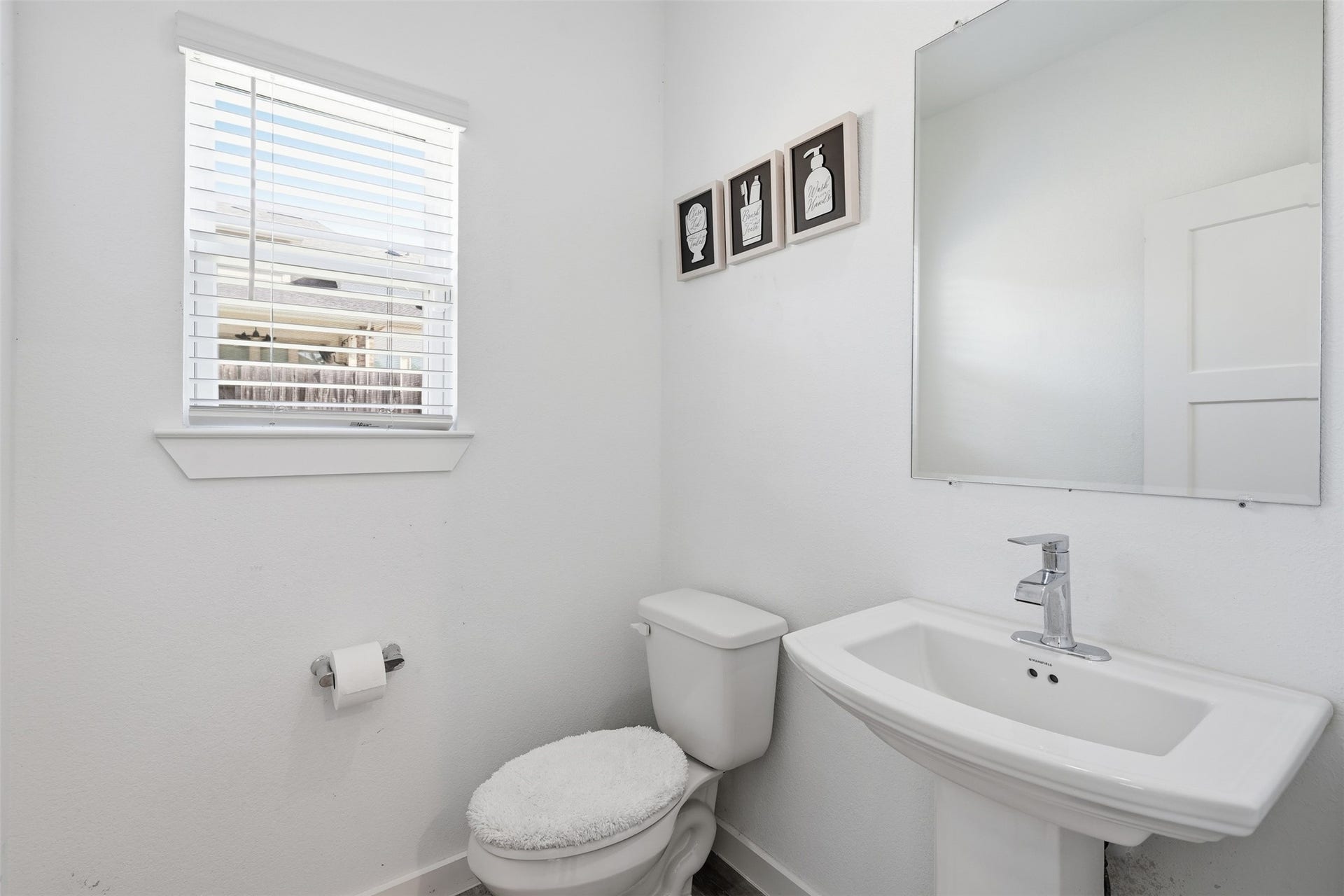 322 Westlake Terrace Drive, Conroe, TX 77304 Powder Bath is down
