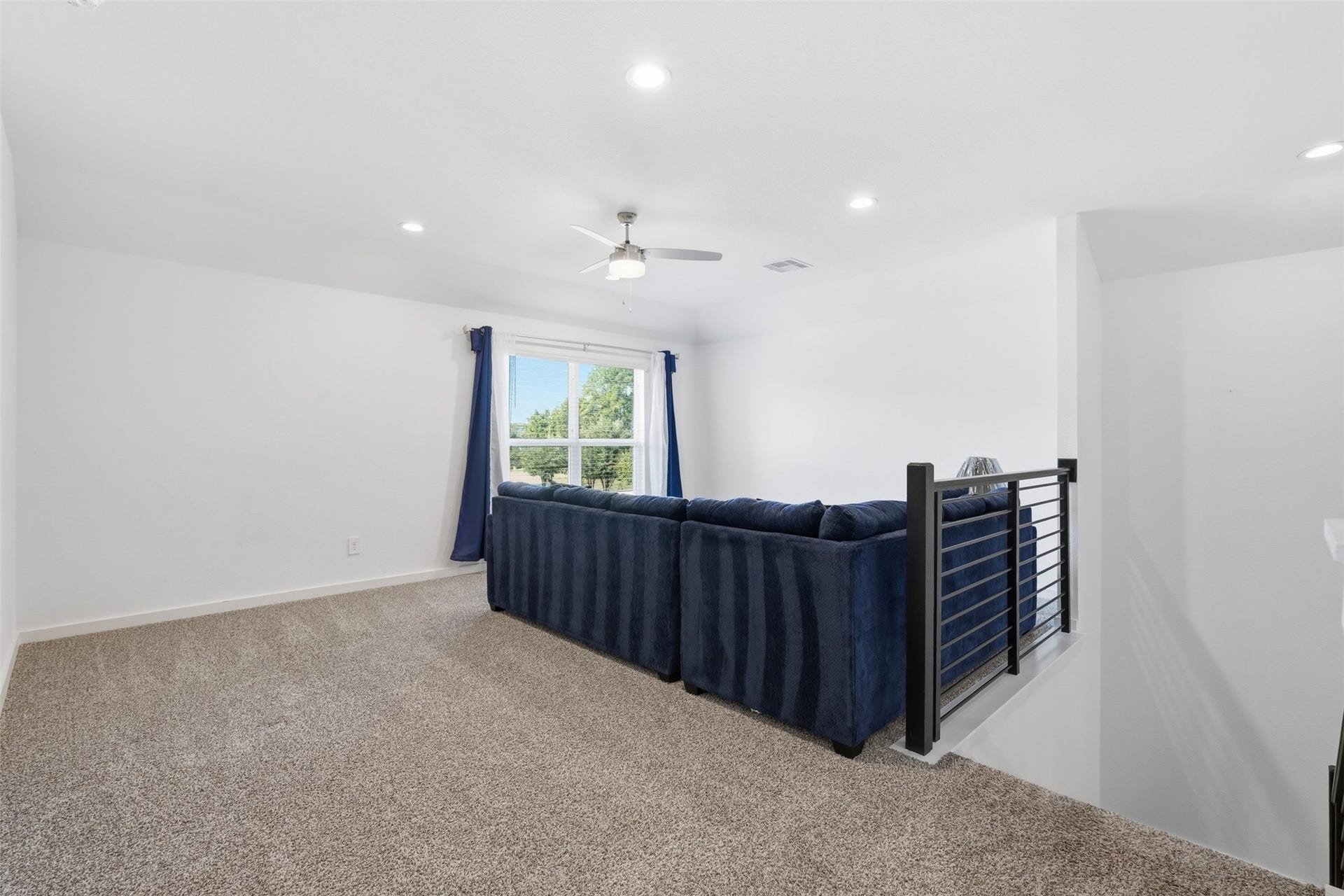 322 Westlake Terrace Drive, Conroe, TX 77304 Spacious Game room allows for multiple furniture configurations and still have room for play.
