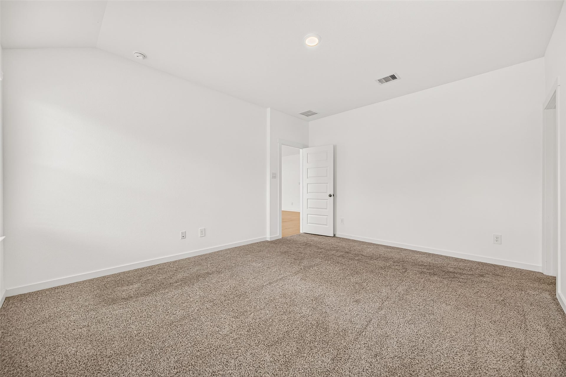 31742 Margaret Woods Lane, Fulshear, TX 77441 Primary bedroom looking toward the family room.