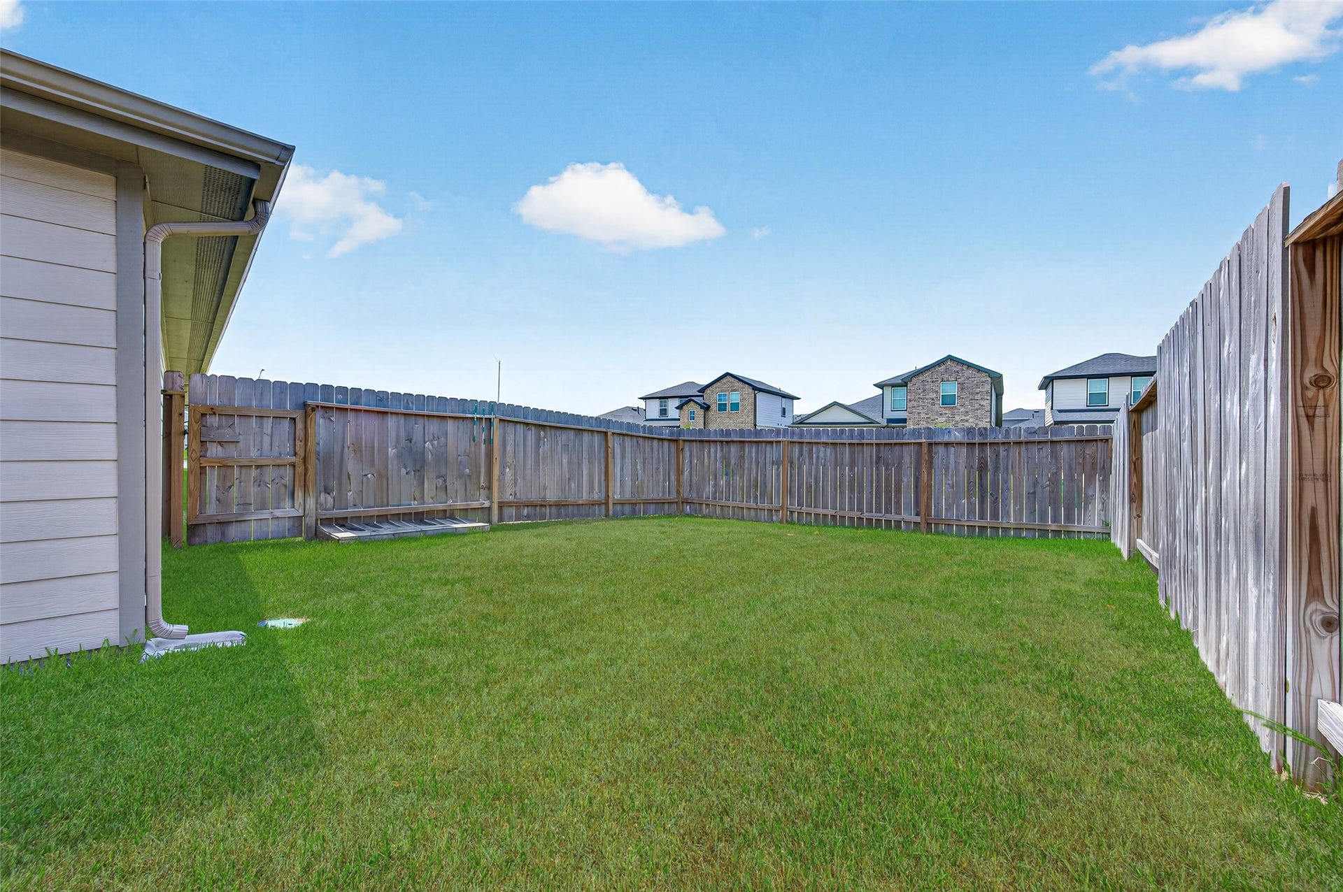 31742 Margaret Woods Lane, Fulshear, TX 77441 Extended back and side yard.