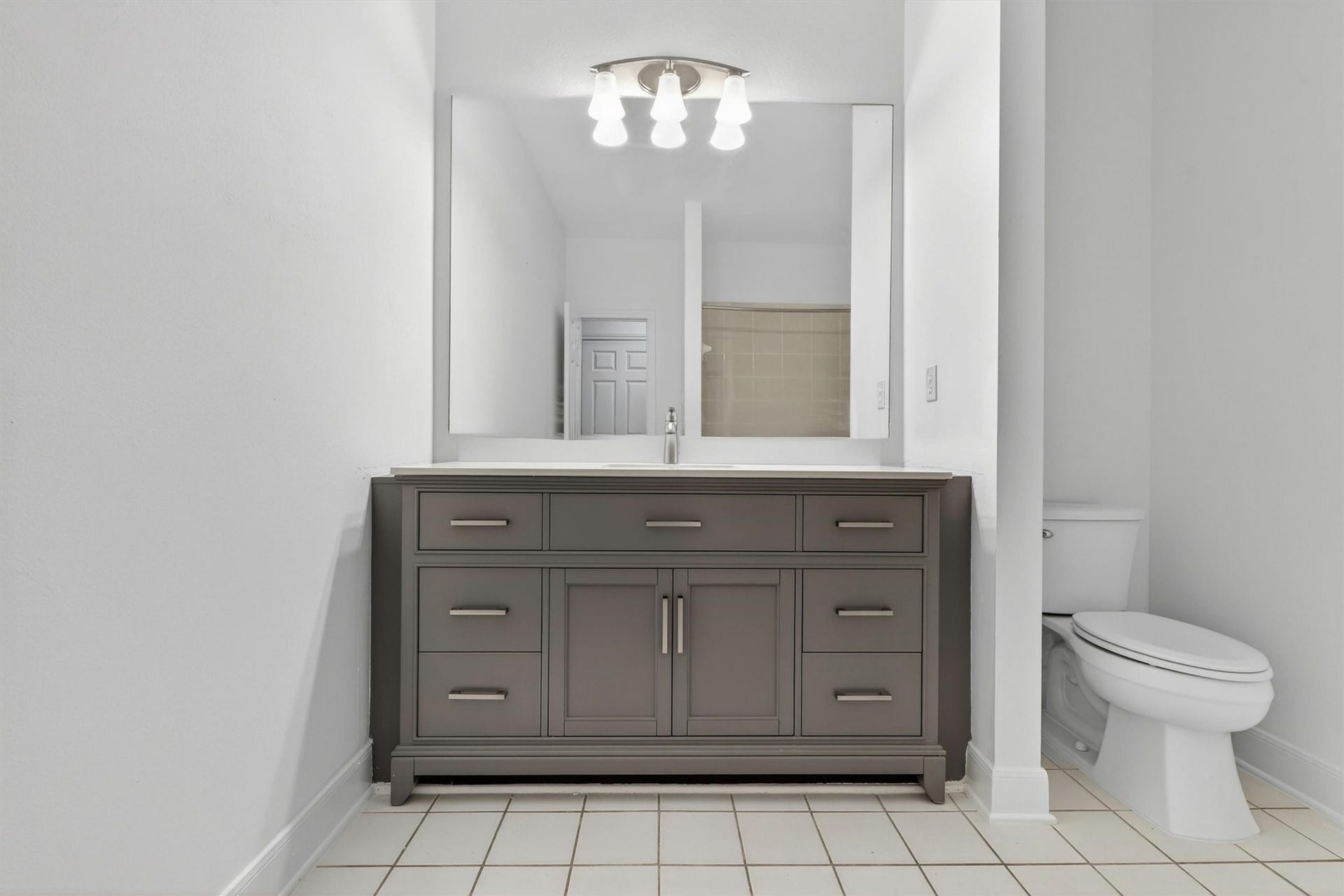 4720 Post Oak Timber Drive, #23, Houston, TX 77056 Updated bathrooms with modern fixtures and designer touches.