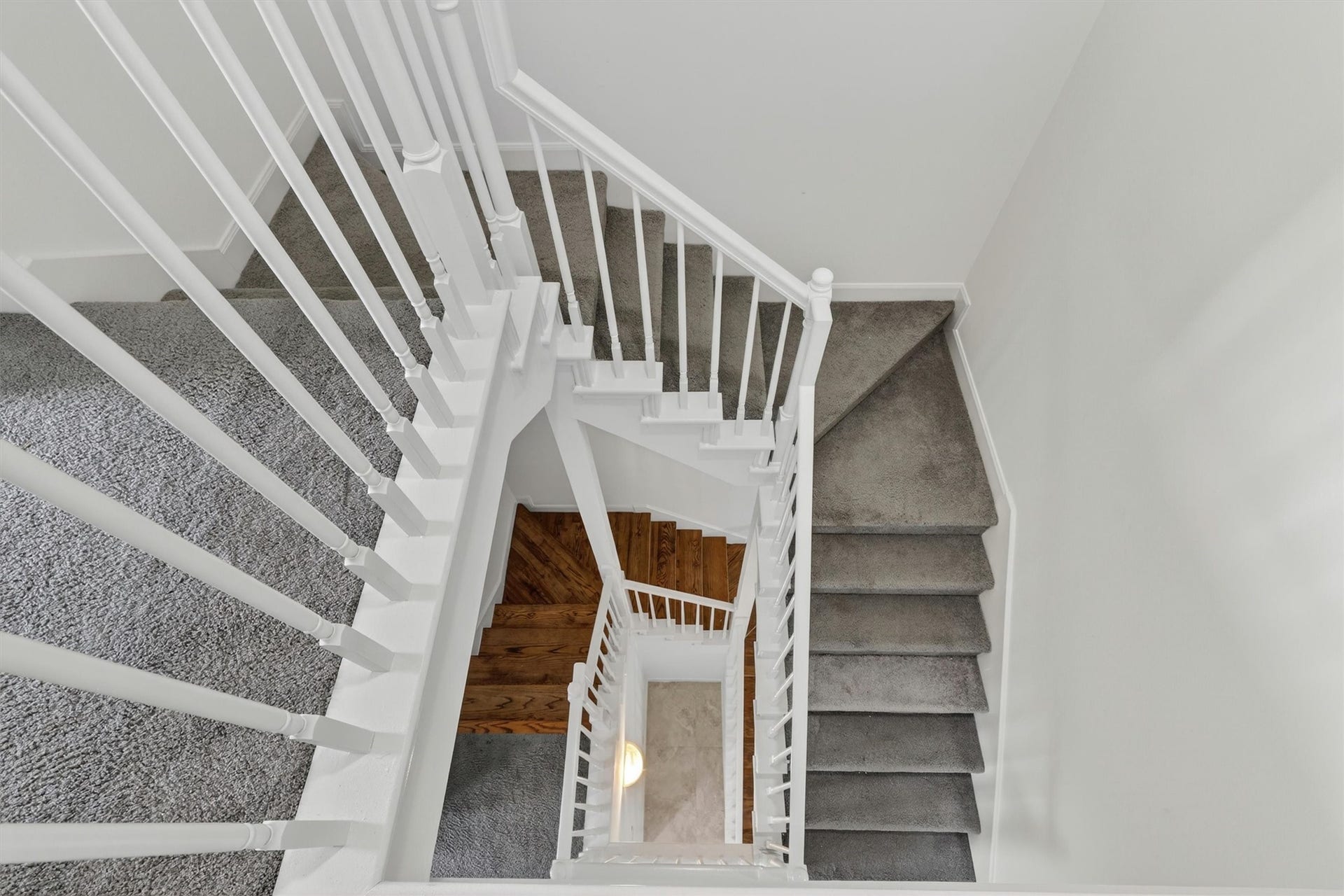 4720 Post Oak Timber Drive, #23, Houston, TX 77056 Modern staircase design creating an elegant architectural focal point.