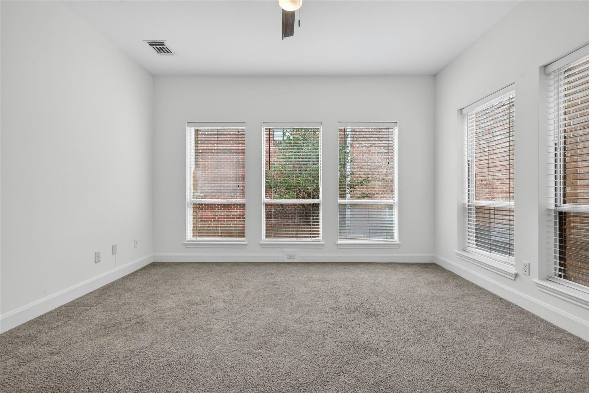 4720 Post Oak Timber Drive, #23, Houston, TX 77056 Large secondary bedroom with generous natural light and neutral finishes.