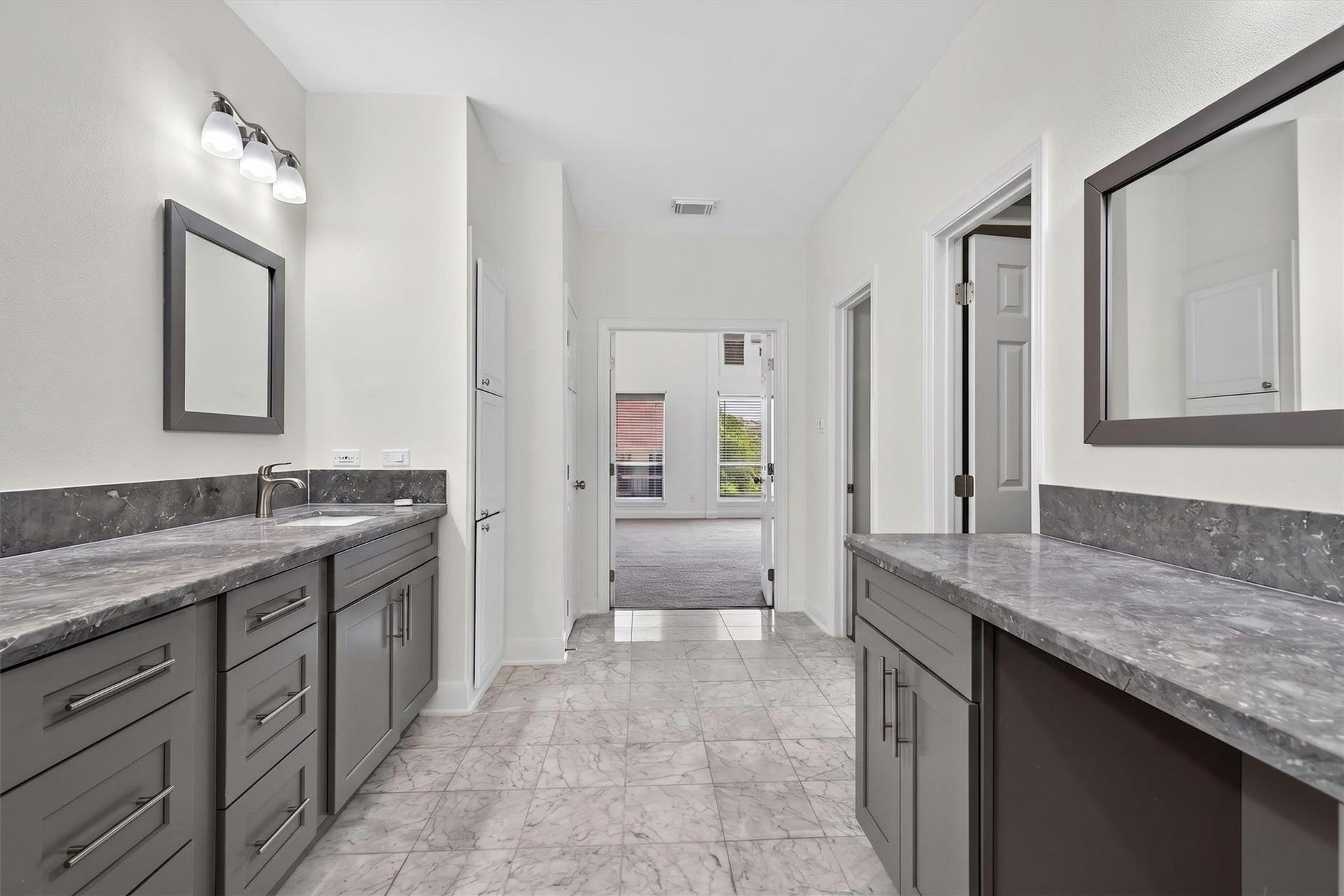 4720 Post Oak Timber Drive, #23, Houston, TX 77056 Spa-inspired primary bath featuring luxury finishes and custom dual vanities.