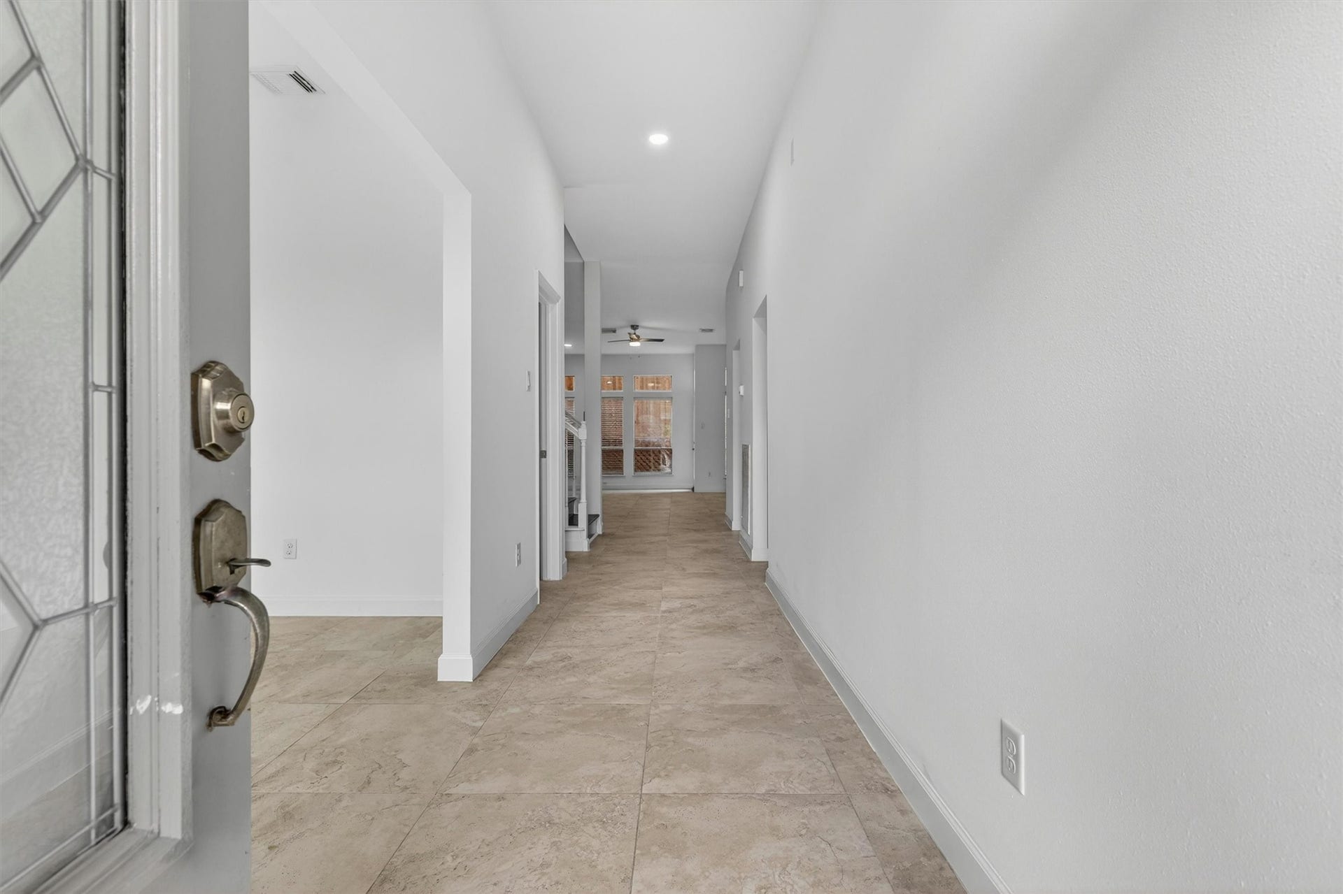 4720 Post Oak Timber Drive, #23, Houston, TX 77056 Welcoming entry with soaring ceilings and modern luxury finishes throughout.