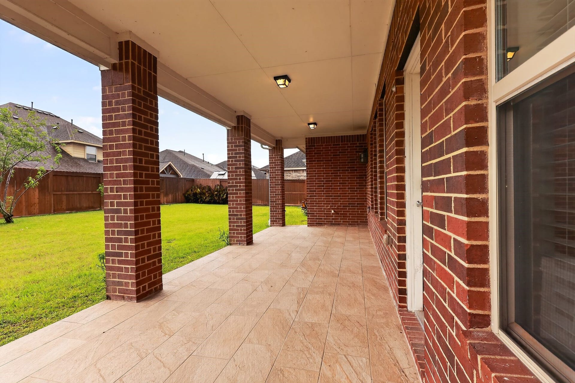 2608 Holbrook Springs Lane, League City, TX 77573 Covered tile patio