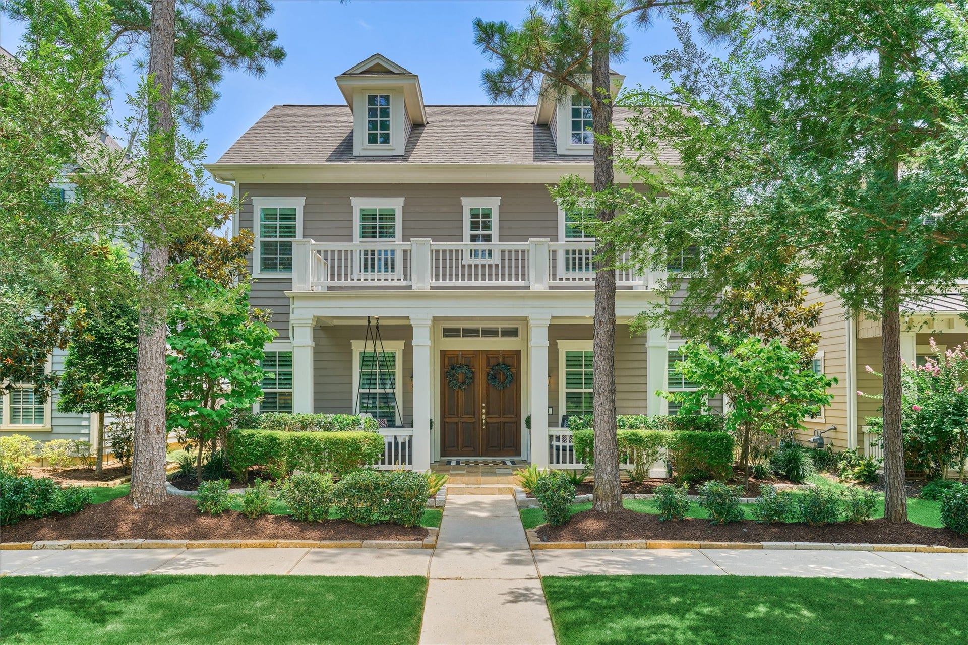 Stunning curb appeal with a charming front elevation, conveniently located one block from shopping, dining, coffee shops, parks, schools, and entertainment.