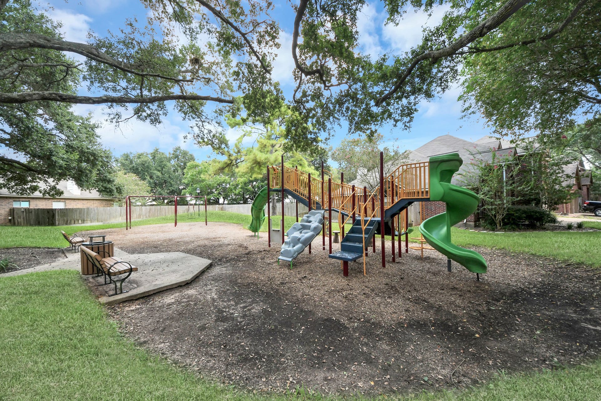 4634 Jaymar Dr, Sugar Land, TX 77479 Nearby community playground shaded by mature trees.