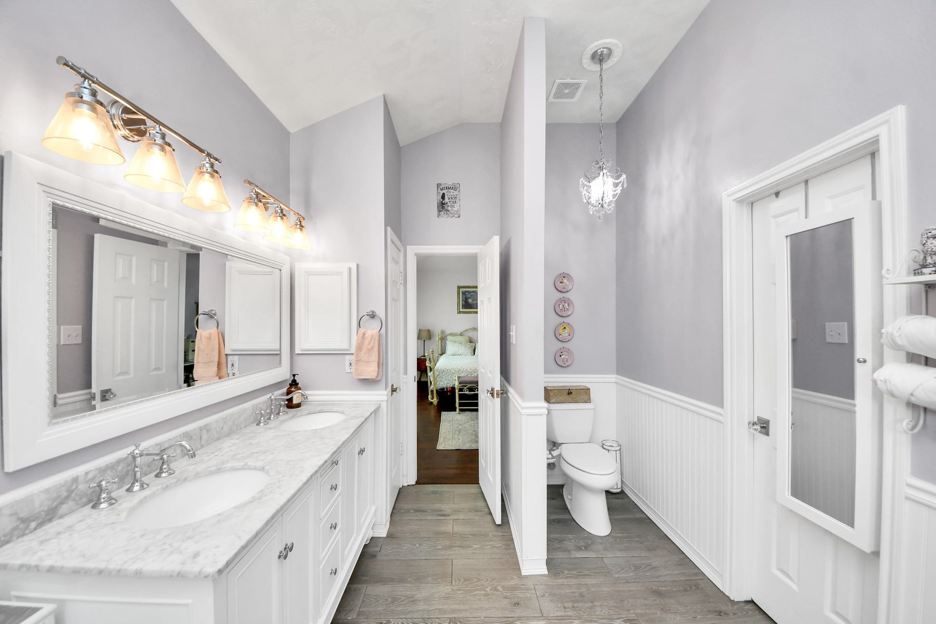4634 Jaymar Dr, Sugar Land, TX 77479 Double sinks, excellent storage, and a separate water-closet area complete the primary bathroom.